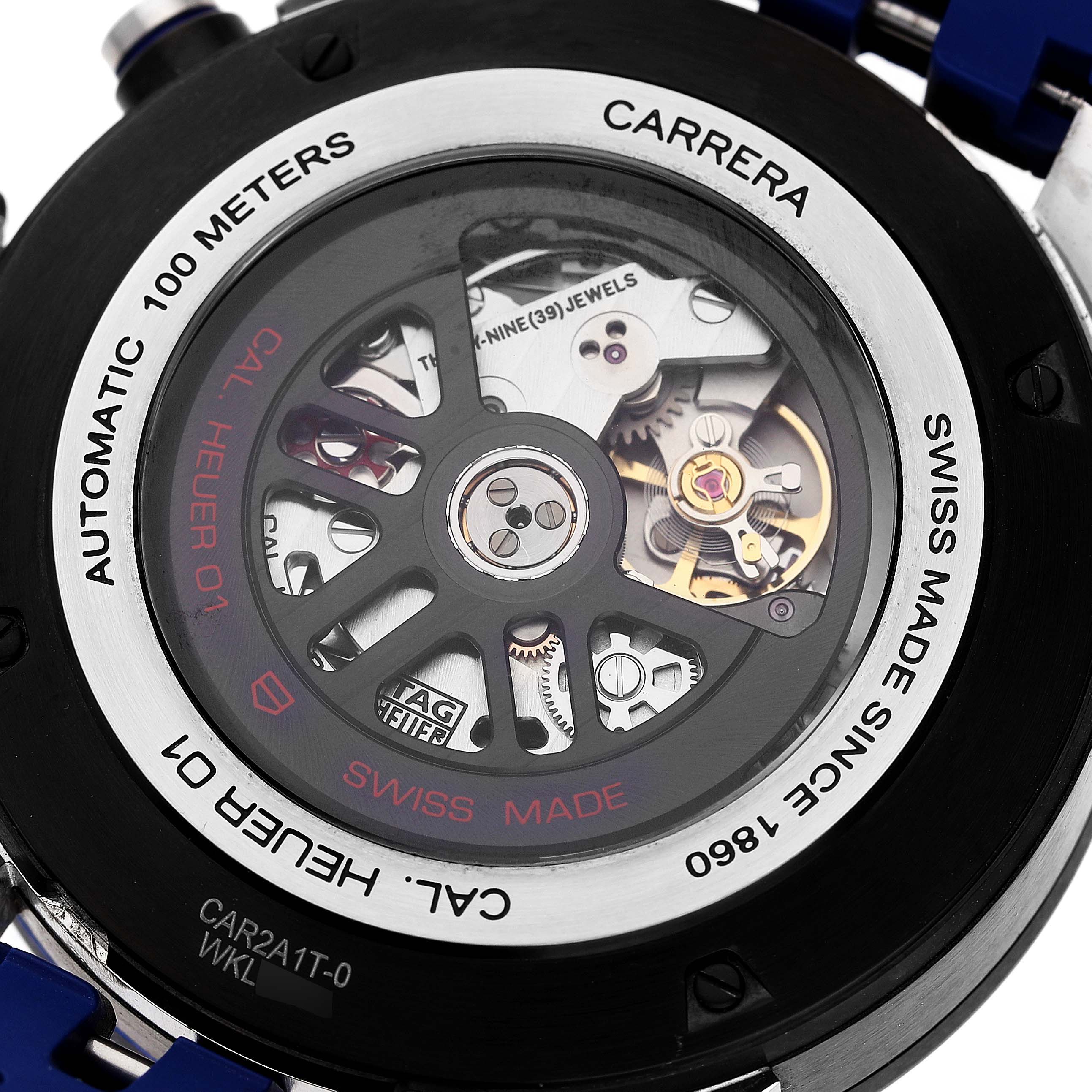 This image shows the back view of a Tag Heuer Carrera CAR2A1T Men's Titanium Black Dial CAR2A1T Men's Titanium Black Dial watch, revealing its automatic movement and internal mechanisms.