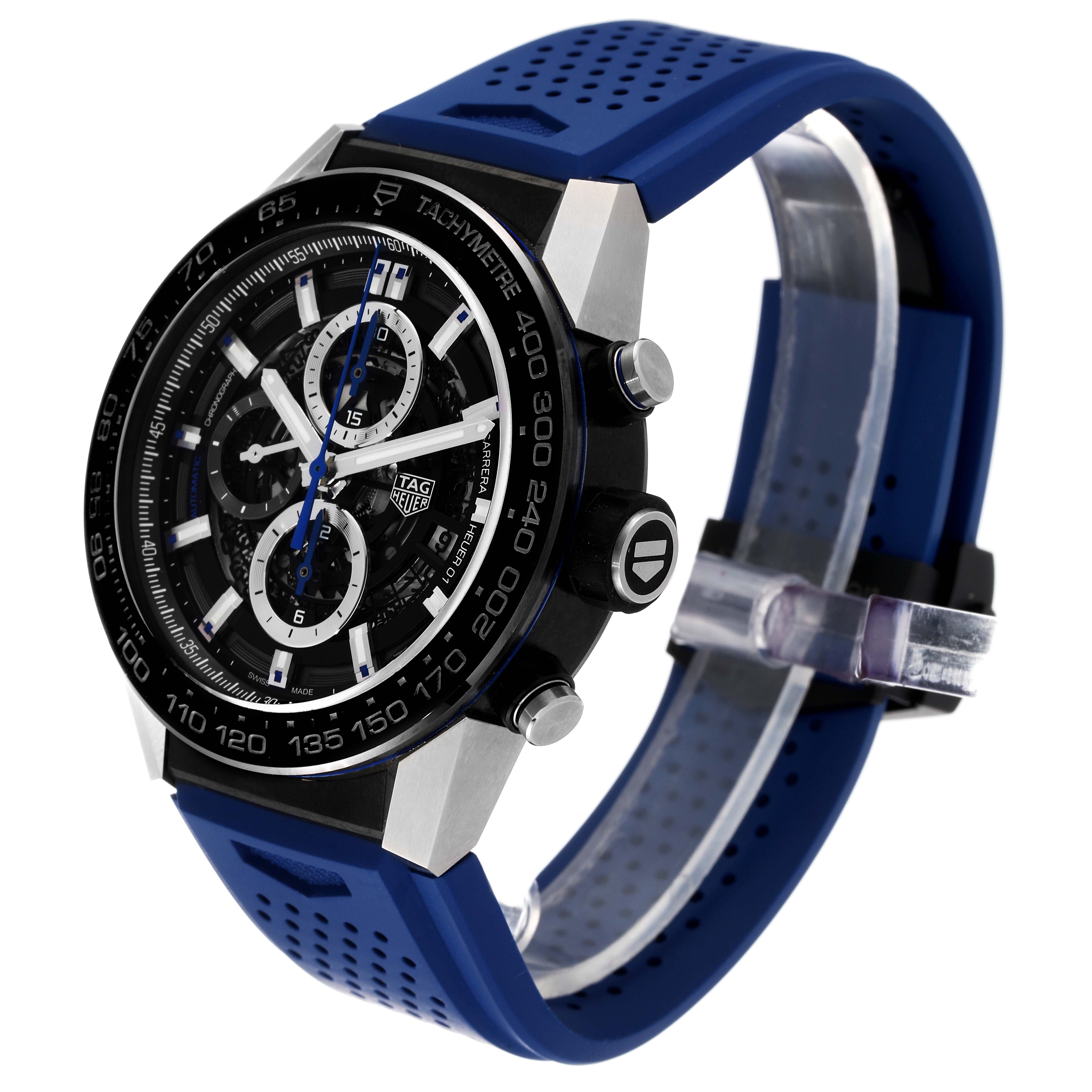 The image shows a Tag Heuer Carrera CAR2A1T Men's Titanium Black Dial CAR2A1T Men's Titanium Black Dial watch at a three-quarter angle, highlighting the watch face, tachymeter bezel, and blue strap.