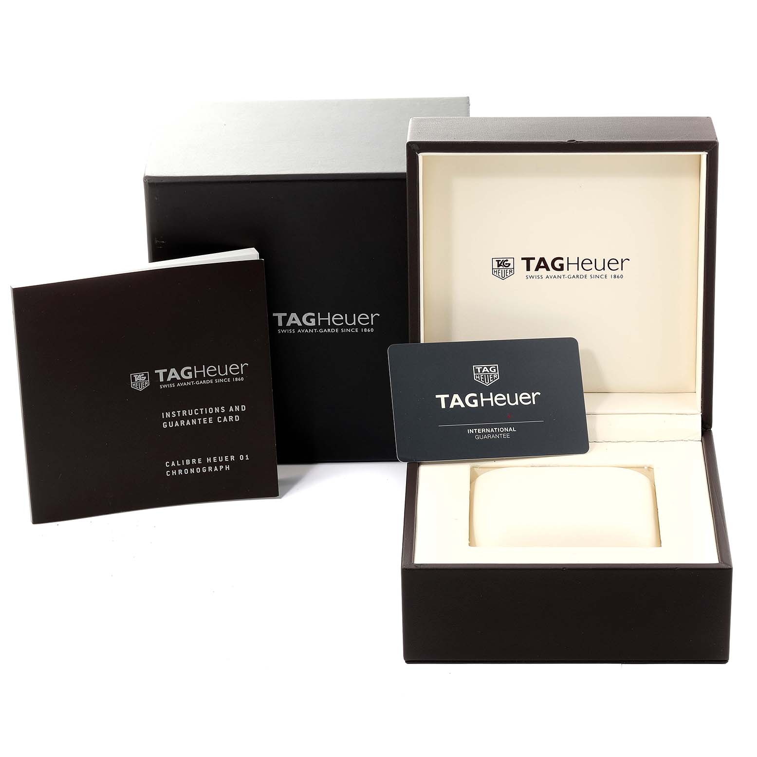 The image shows the packaging, instructions, and international guarantee card for a Tag Heuer Carrera CAR2A1T Men's Titanium Black Dial CAR2A1T Men's Titanium Black Dial watch.