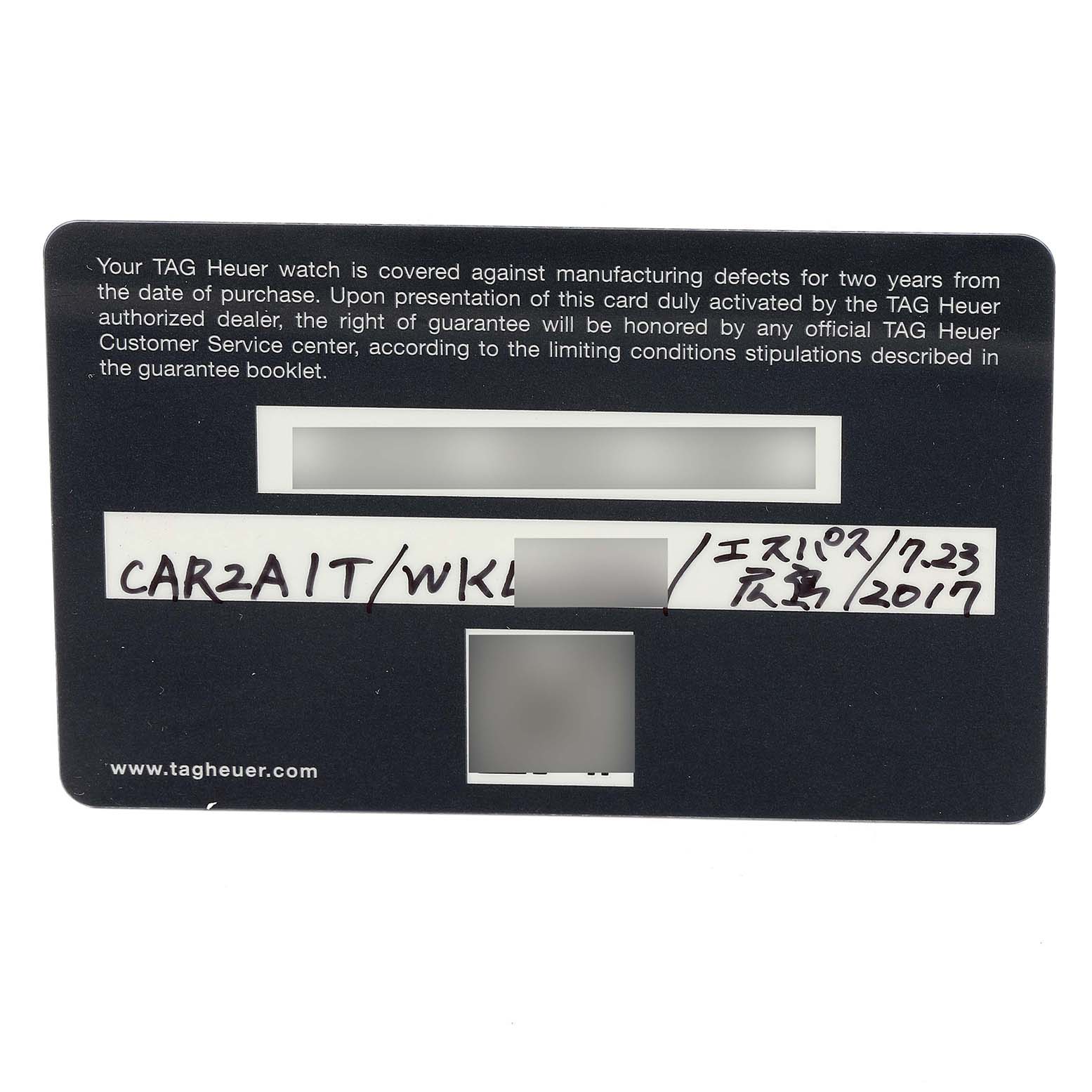 This is a warranty card for a Tag Heuer Carrera CAR2A1T Men's Titanium Black Dial CAR2A1T Men's Titanium Black Dial watch, showing coverage details and handwritten information.