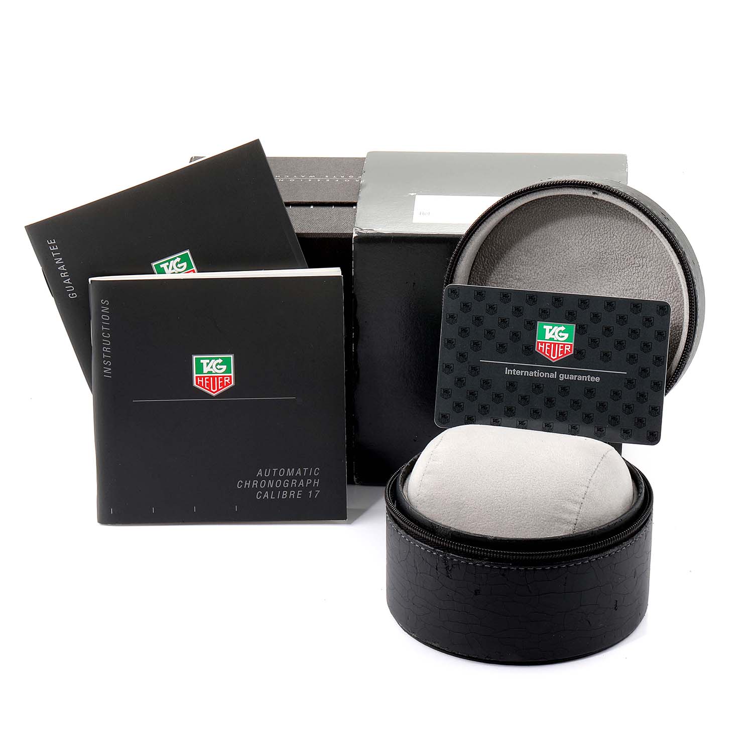 The image shows the box, guarantee card, instruction manual, and a zippered case for the Tag Heuer Limited Edition CV2117.FC6182 Men's Stainless Steel Silver Dial CV2117.FC6182 Men's Stainless Steel Silver Dial model.