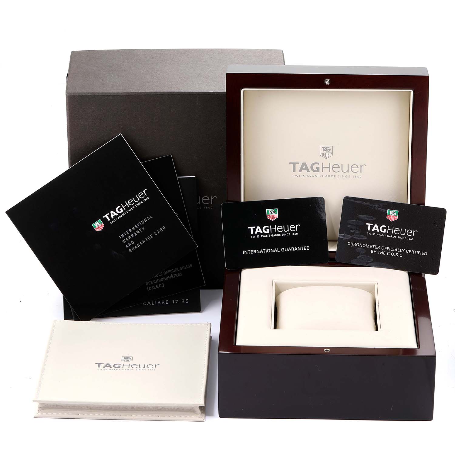 This image shows the packaging, manuals, and international guarantee cards for the Tag Heuer Limited Edition CAV511F Men's Stainless Steel Blue Dial CAV511F Men's Stainless Steel Blue Dial model.