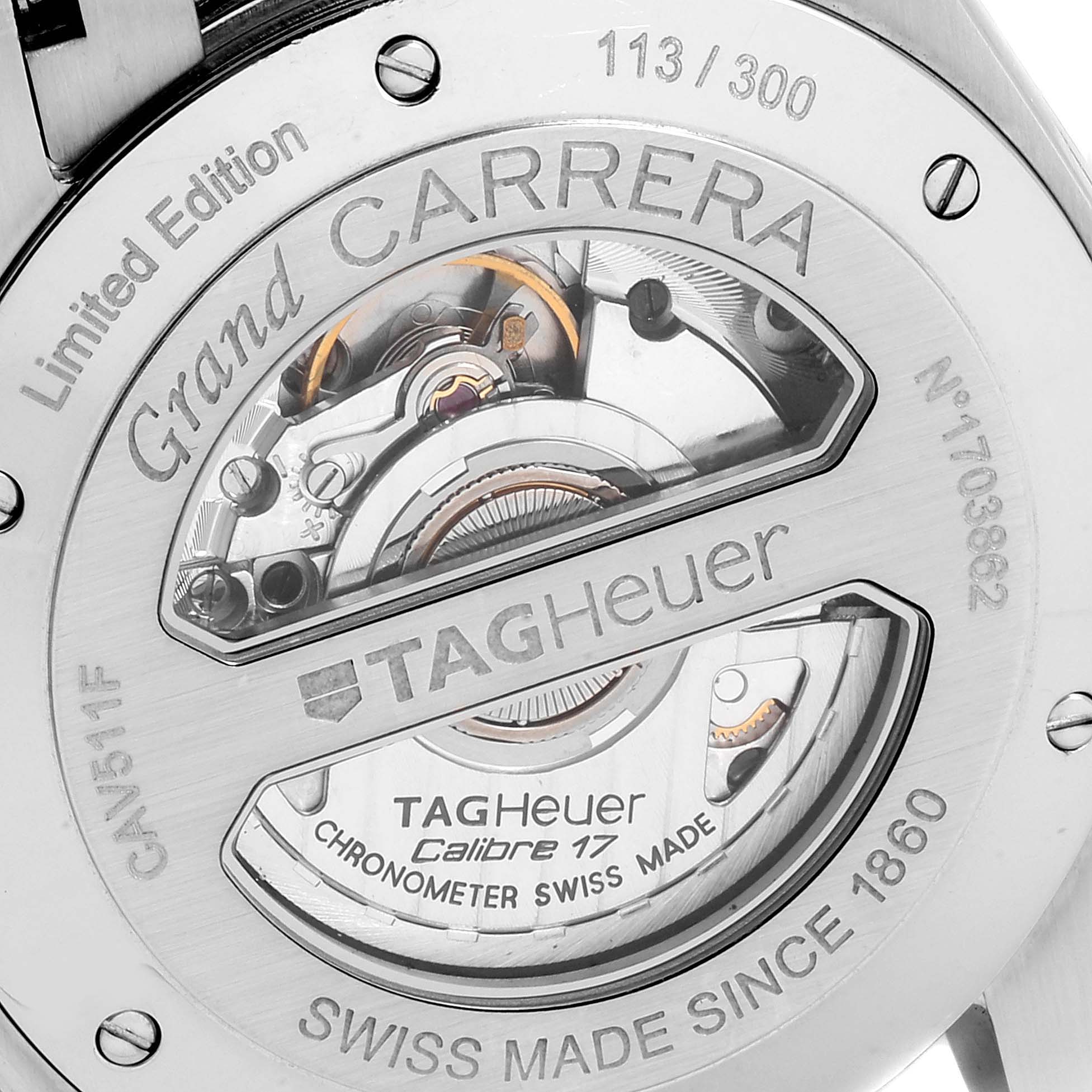 The image shows the back case of the Limited Edition Tag Heuer Grand Carrera watch, highlighting its intricate mechanism and limited edition number.