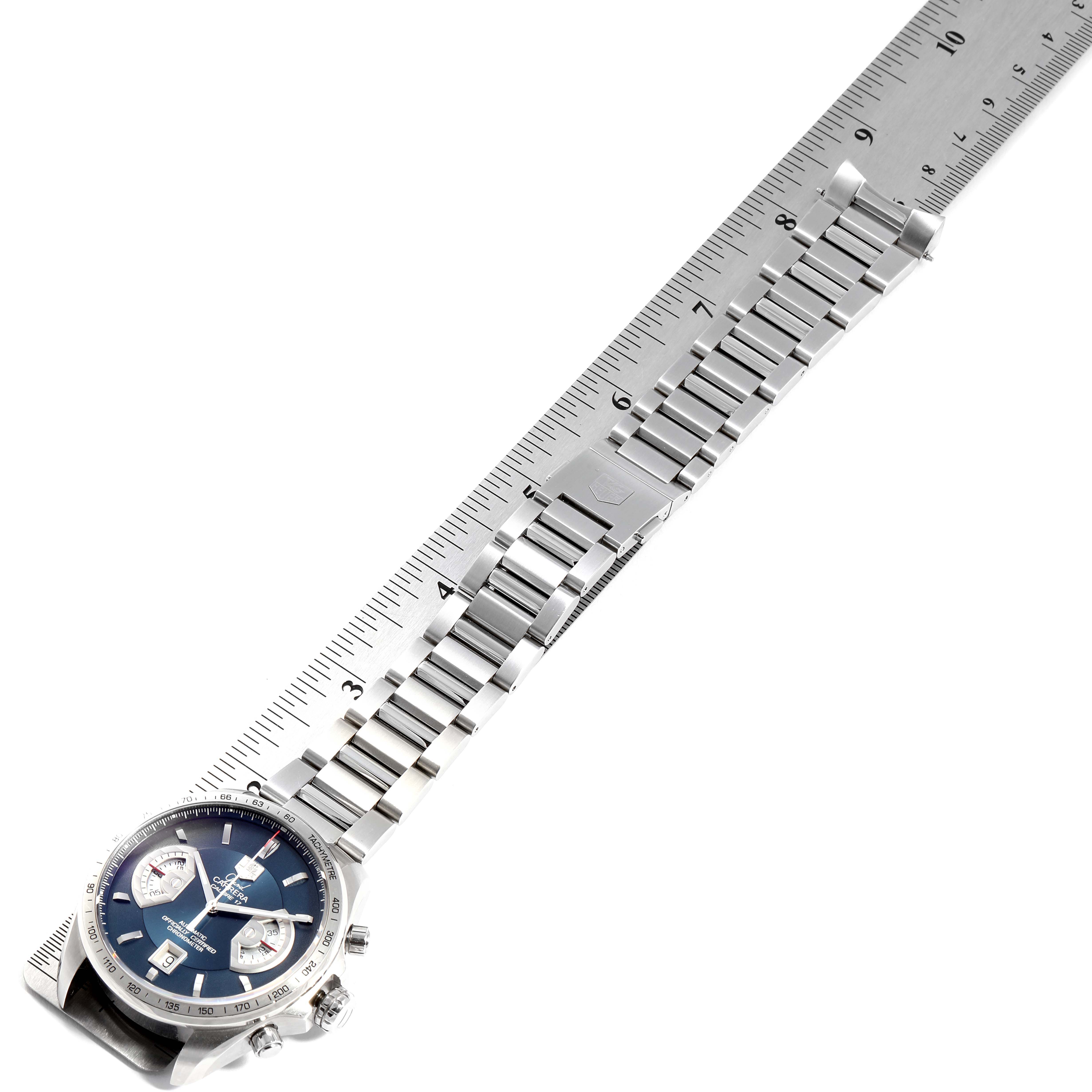 The image shows the face and full metal strap of a Tag Heuer Carrera Limited Edition watch, positioned next to a ruler for measurement.
