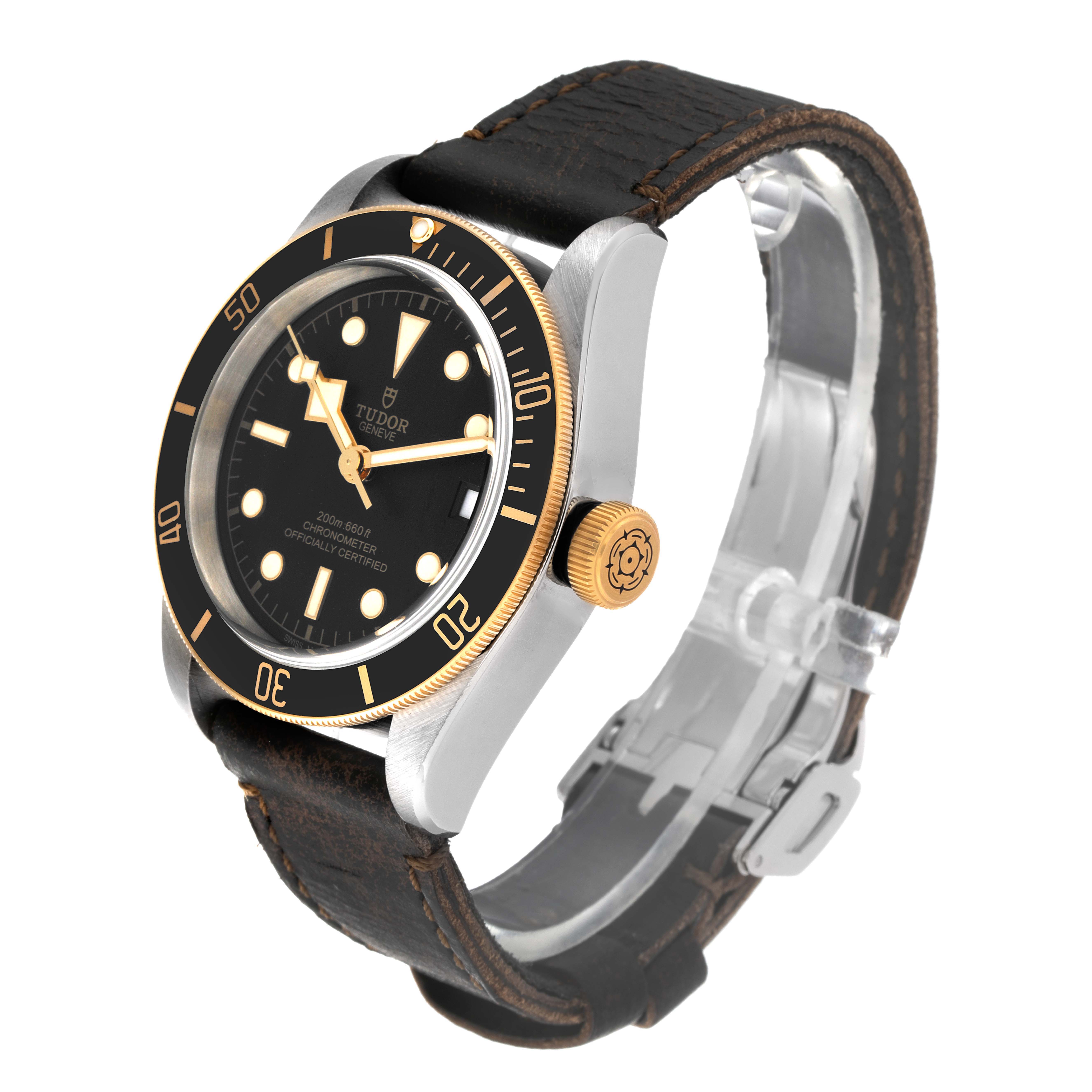 The Tudor Heritage Black Bay 79733N Men's Steel and Gold (two tone) Black Dial 79733N Men's Steel and Gold (two tone) Black Dial watch is shown at a three-quarter angle, displaying the face, bezel, crown, and leather strap.