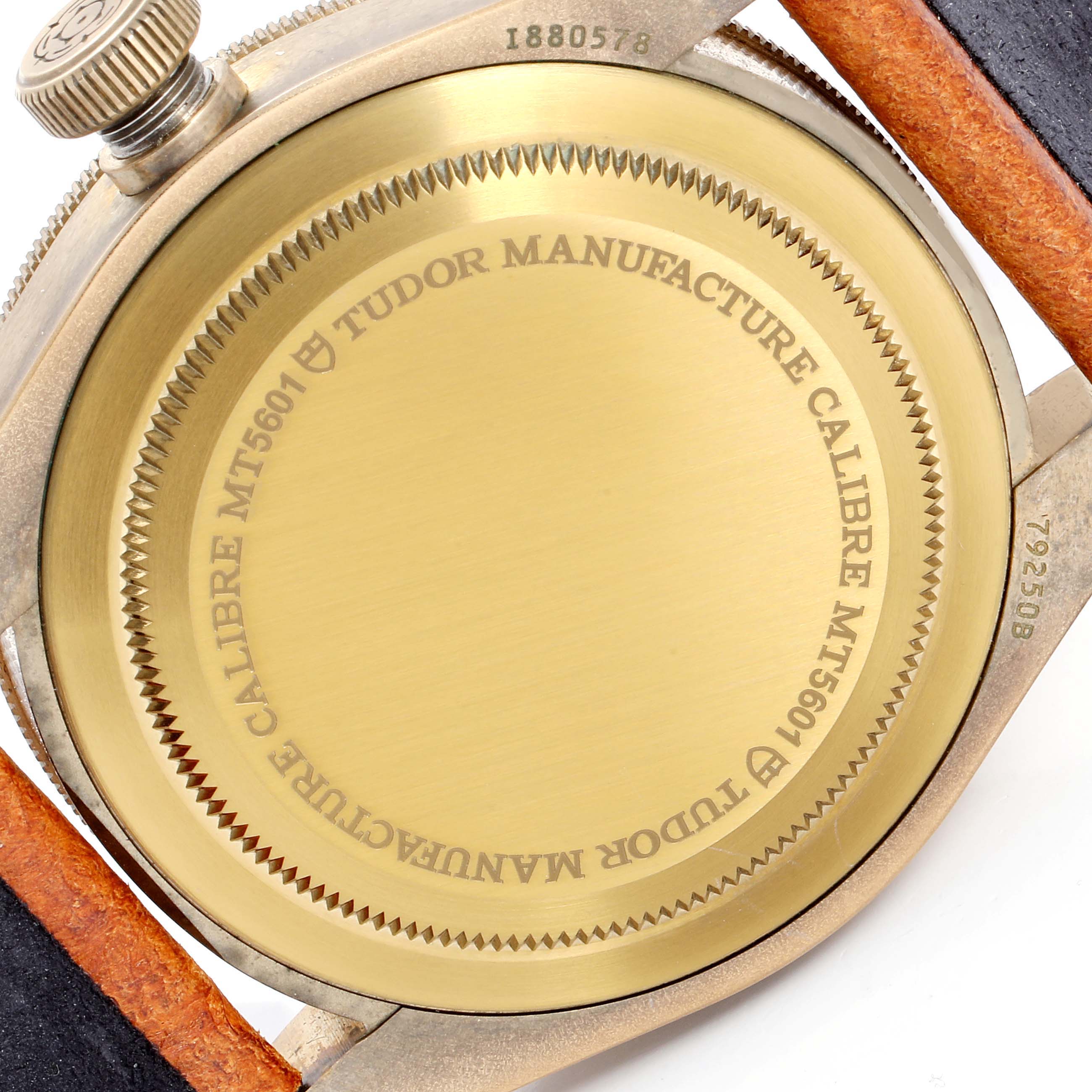 The image shows the back case of the Heritage Black Bay model by Tudor, highlighting the "TUDOR MANUFACTURE CALIBRE MT5601" engraving.