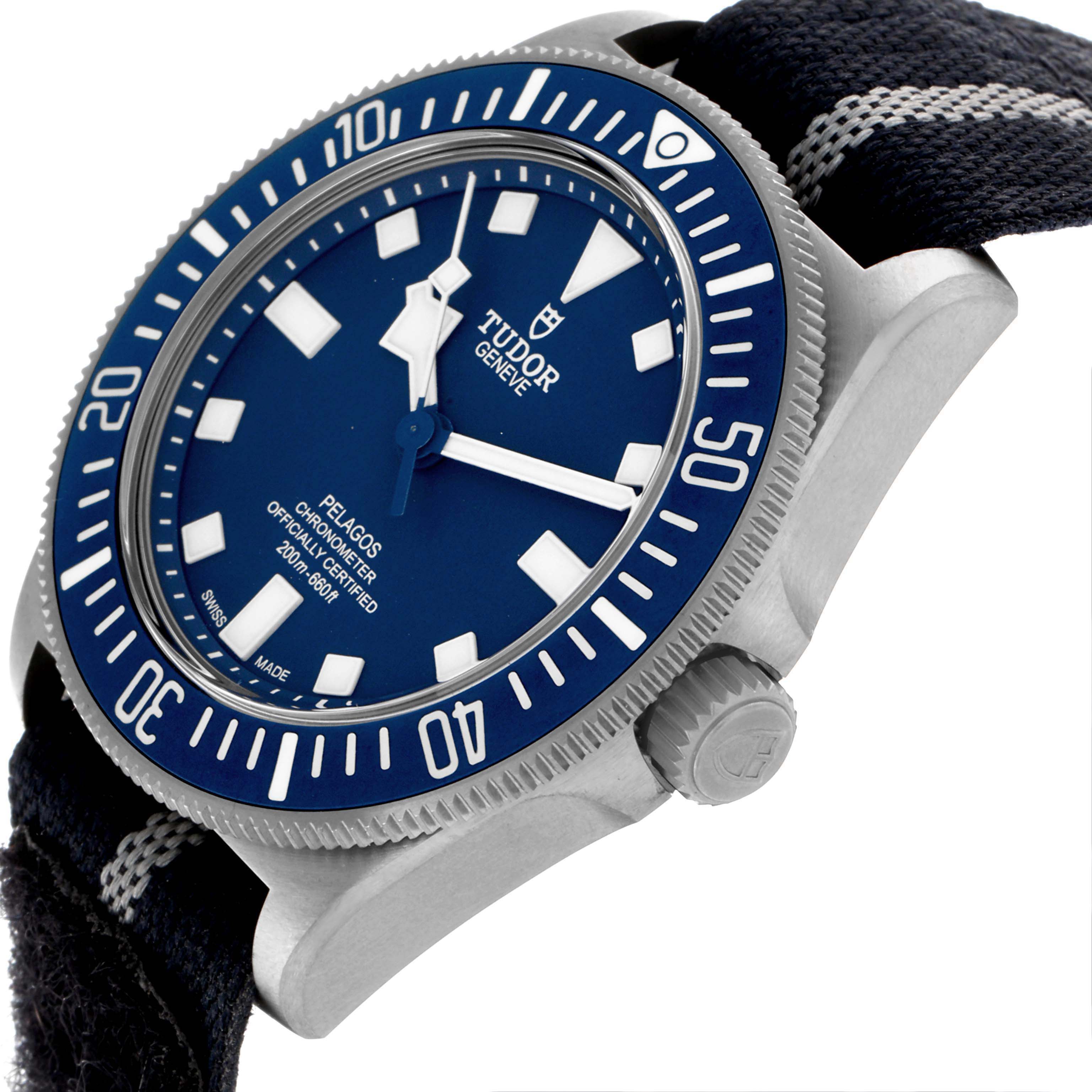 The Tudor Pelagos 25707B Men's Titanium Blue Dial 25707B Men's Titanium Blue Dial watch is shown at an oblique angle, highlighting the dial, bezel, and crown.