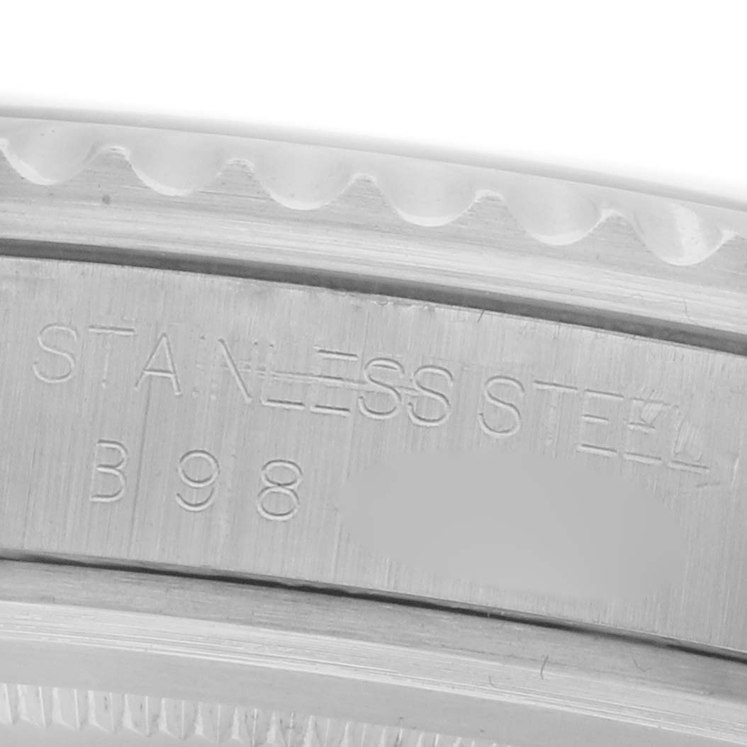 The image shows a close-up of the engraved stainless steel back of the Tudor Submariner 79190 Men's Stainless Steel Black Dial 79190 Men's Stainless Steel Black Dial watch.