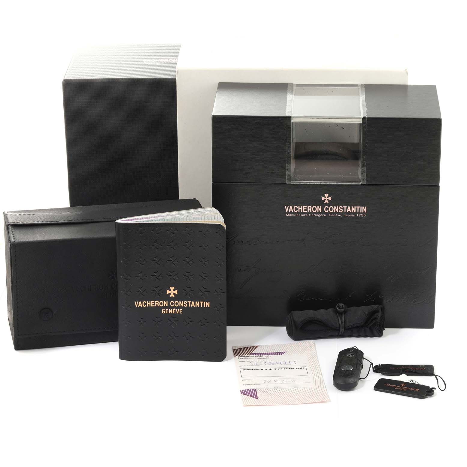 The image shows the packaging, booklet, and accessories of a Vacheron Constantin Overseas 47450/B01A-9227 Men's Stainless Steel Black Dial 47450/B01A-9227 Men's Stainless Steel Black Dial watch.