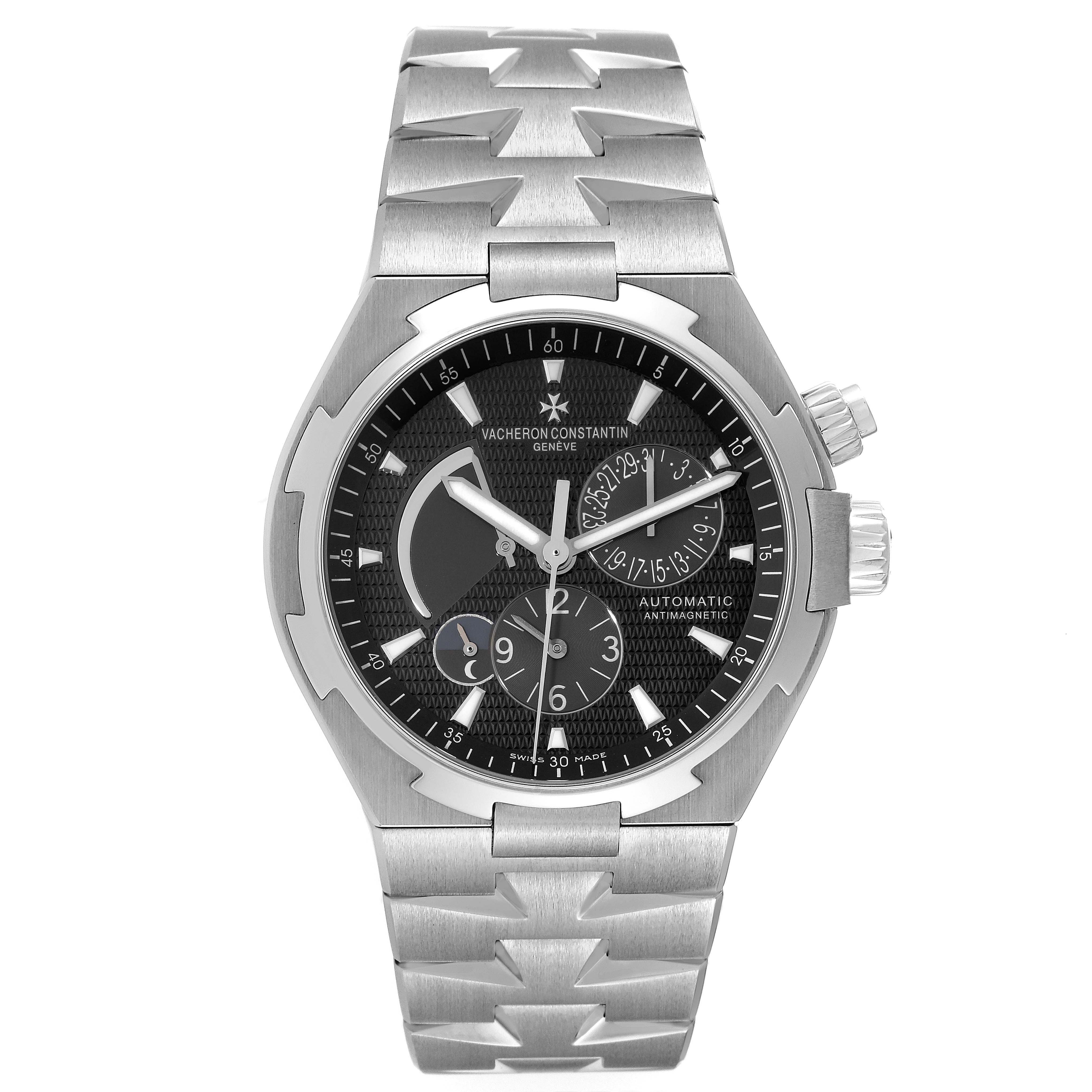 The image shows a front view of the Vacheron Constantin Overseas 47450/B01A-9227 Men's Stainless Steel Black Dial 47450/B01A-9227 Men's Stainless Steel Black Dial watch, displaying its black dial and stainless steel bracelet.