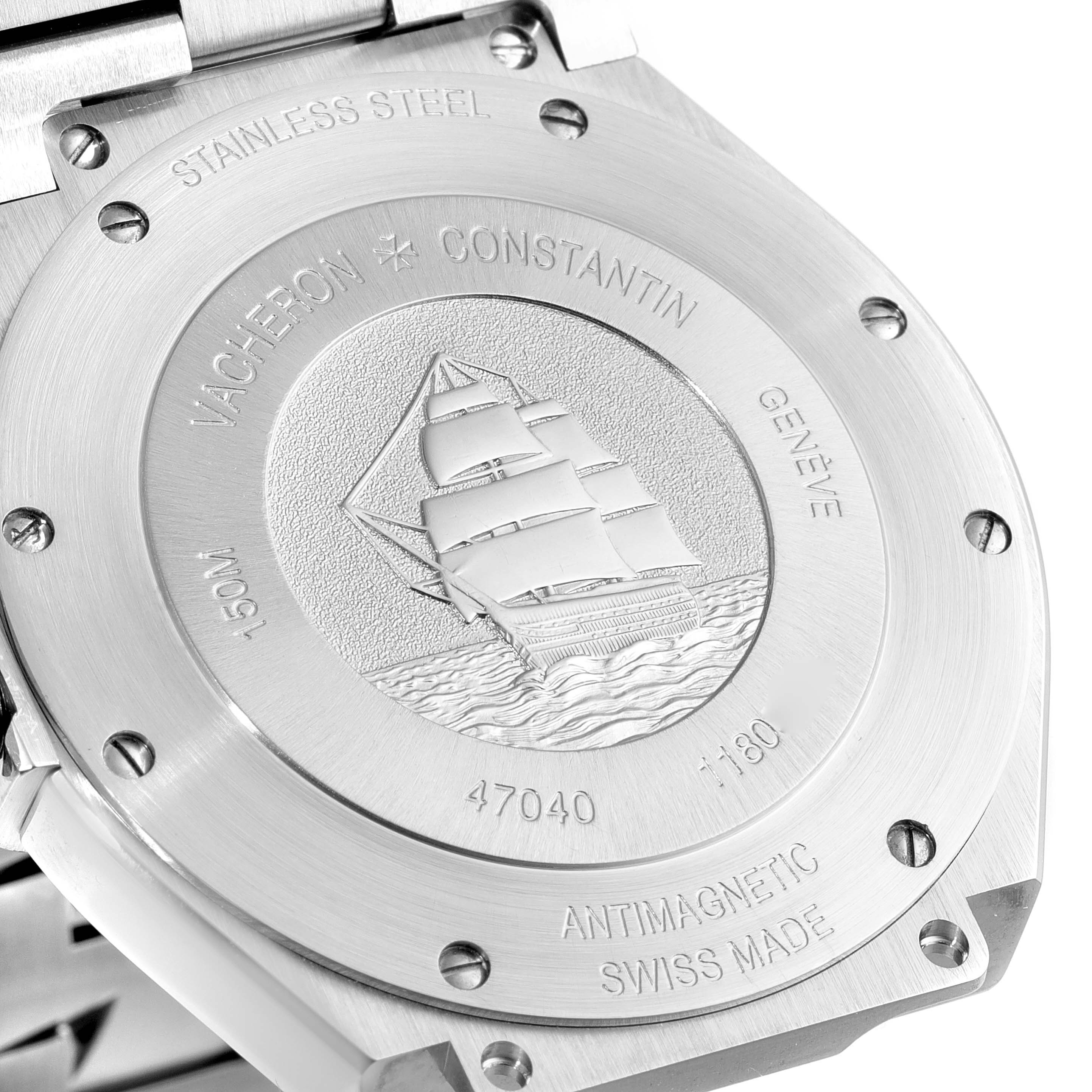 This image shows the case back of a Vacheron Constantin Overseas 47040B01A-9093 Men's Stainless Steel Silver Dial 47040B01A-9093 Men's Stainless Steel Silver Dial watch, featuring an engraving of a ship and various inscriptions.