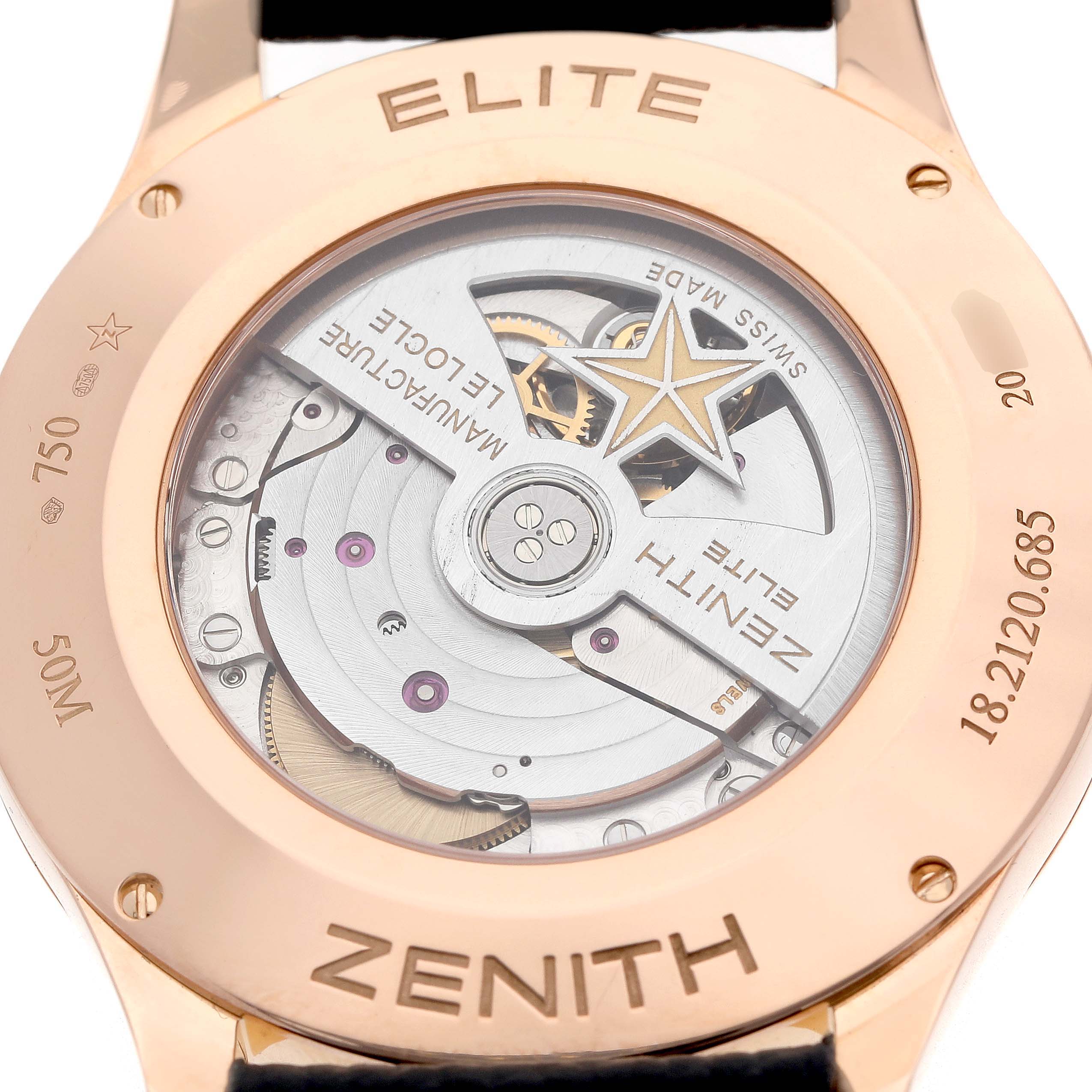 The image shows the back of the Zenith Captain 18.2120.685 Men's Rose Gold Silver Dial model, displaying the movement and case details.