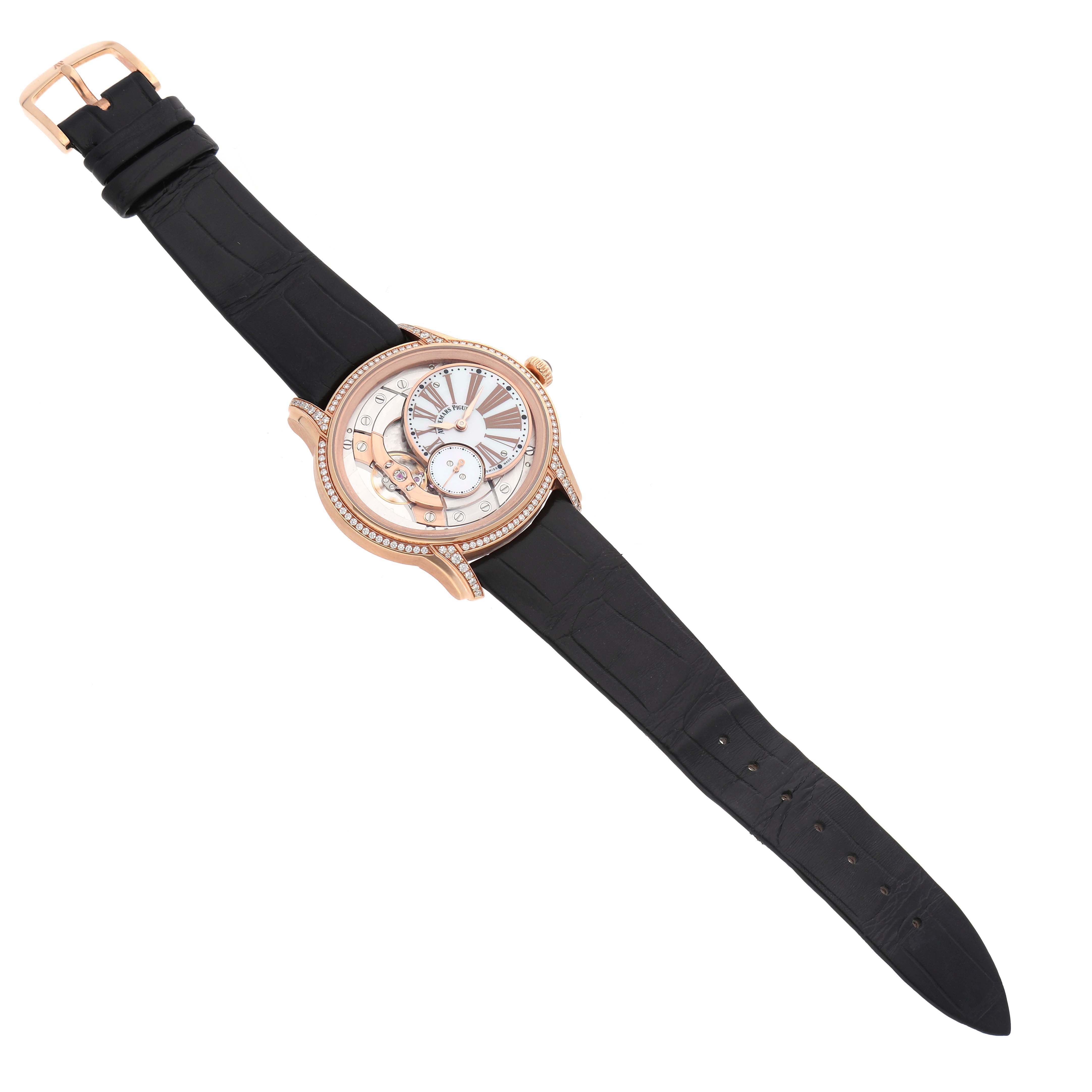 The image shows the full view of an Audemars Piguet Millenary 77247OR Women's Rose Gold Mother of Pearl Dial 77247OR Women's Rose Gold Mother of Pearl Dial watch, highlighting its face, strap, and buckle.