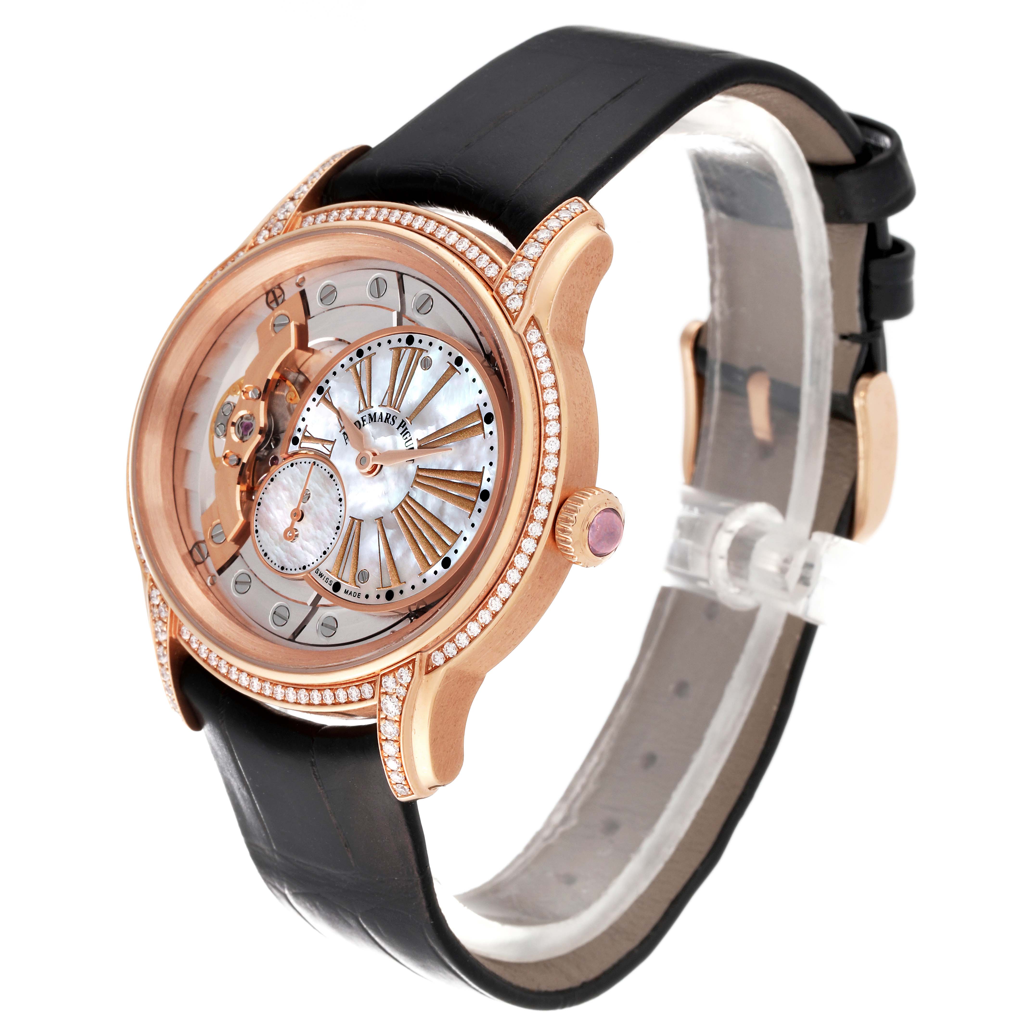 This Audemars Piguet Millenary 77247OR Women's Rose Gold Mother of Pearl Dial 77247OR Women's Rose Gold Mother of Pearl Dial model watch is shown at an angled view, highlighting its dial, bezel, crown, and strap.