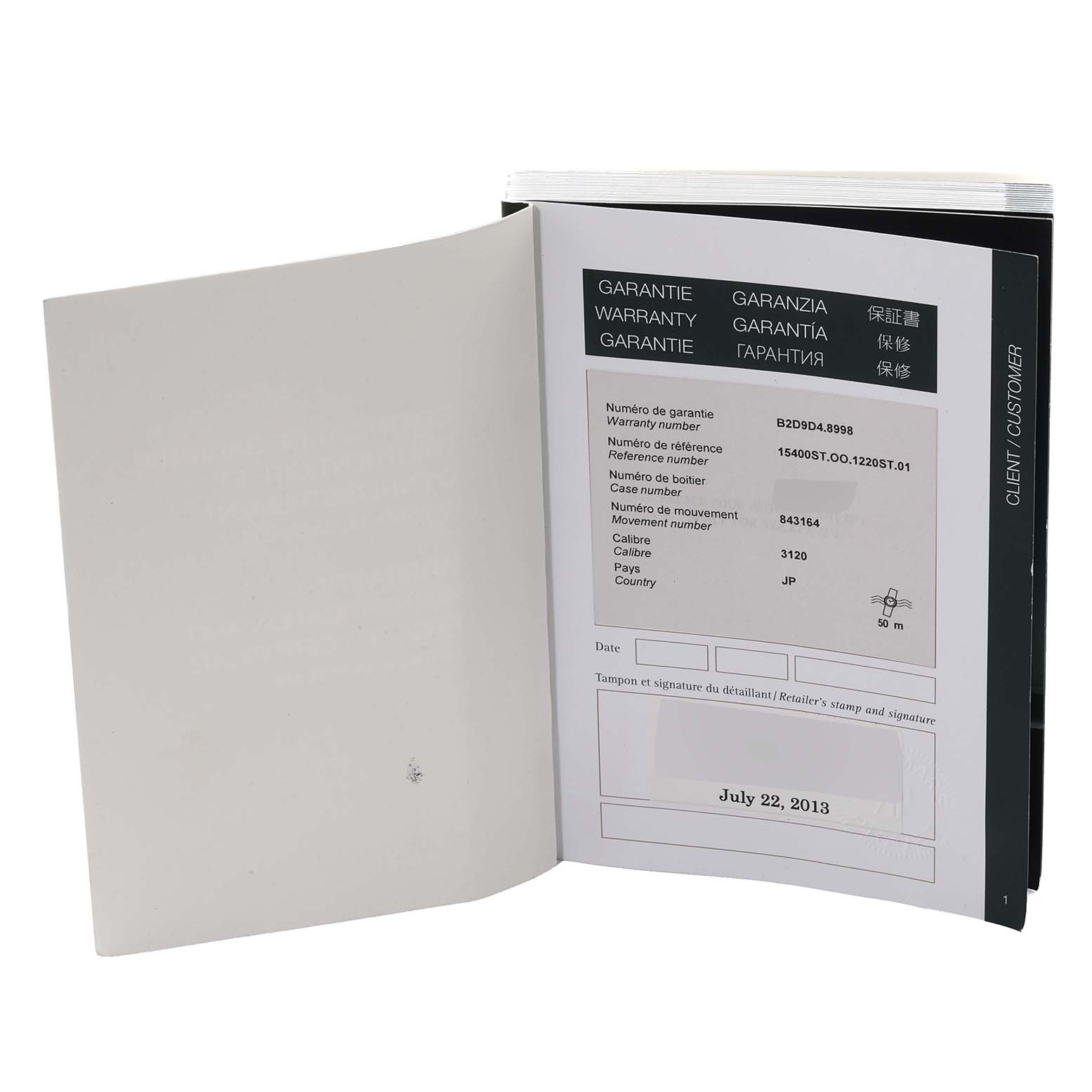 This image shows a warranty booklet for the Royal Oak model by Audemars Piguet, with details including reference and serial numbers.