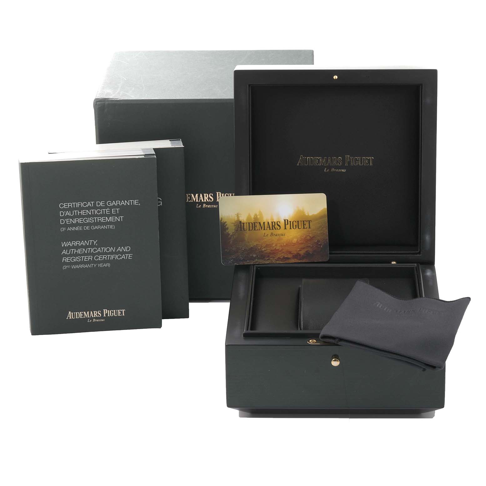 The image shows the presentation box, warranty card, authentication certificate, and cloth for the Audemars Piguet Royal Oak 15400ST.OO.1220ST.01 Men's Stainless Steel Black Dial 15400ST.OO.1220ST.01 Men's Stainless Steel Black Dial.