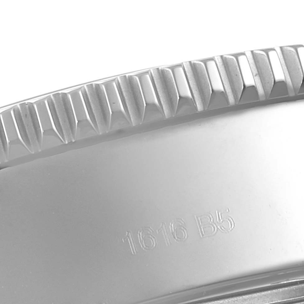 This image shows a close-up of the ridged bezel edge with engraved numbers on the Breitling Superocean A13311 Men's Stainless Steel Blue Dial A13311 Men's Stainless Steel Blue Dial watch.