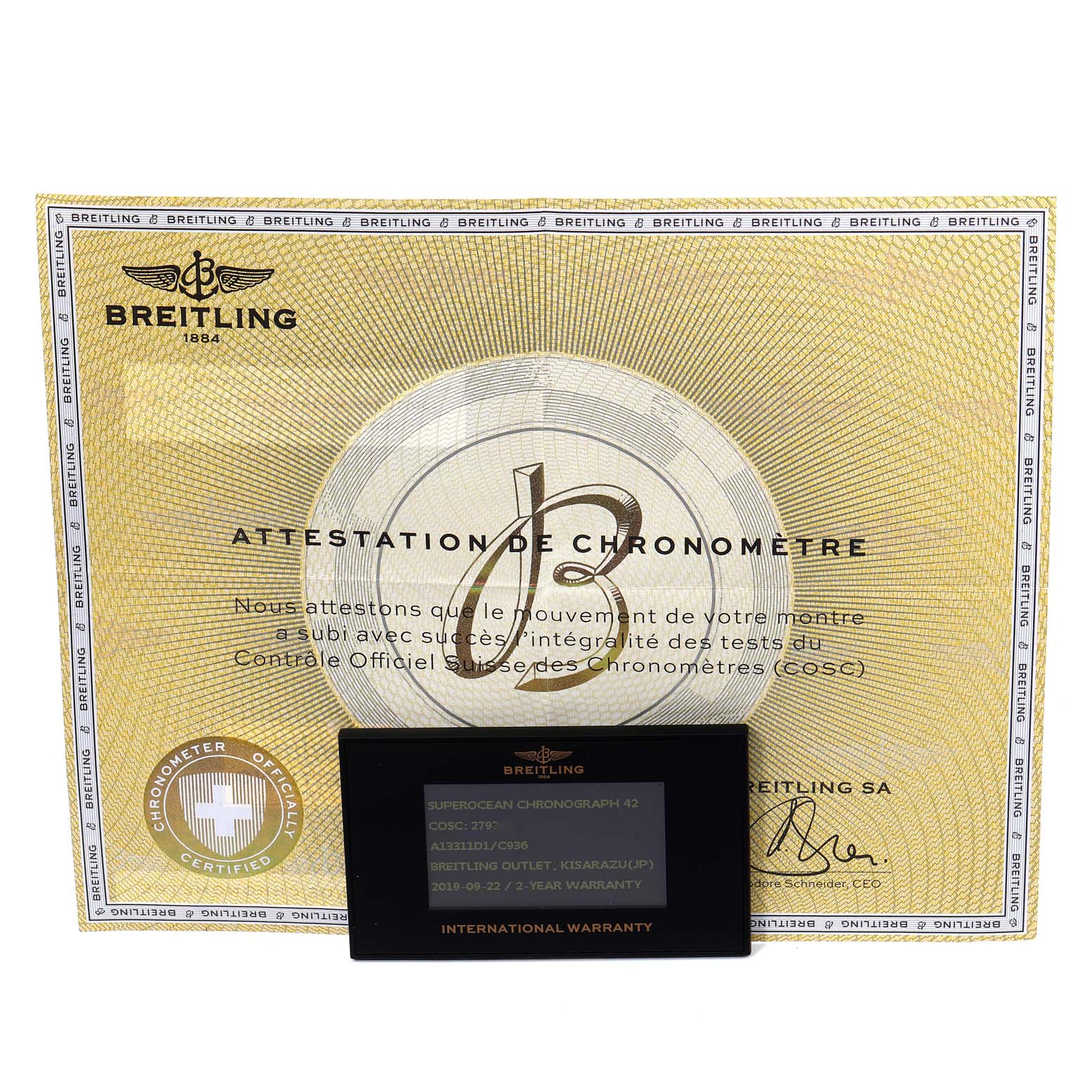 The image shows the certificate and international warranty card for the Breitling Superocean A13311 Men's Stainless Steel Blue Dial A13311 Men's Stainless Steel Blue Dial watch.