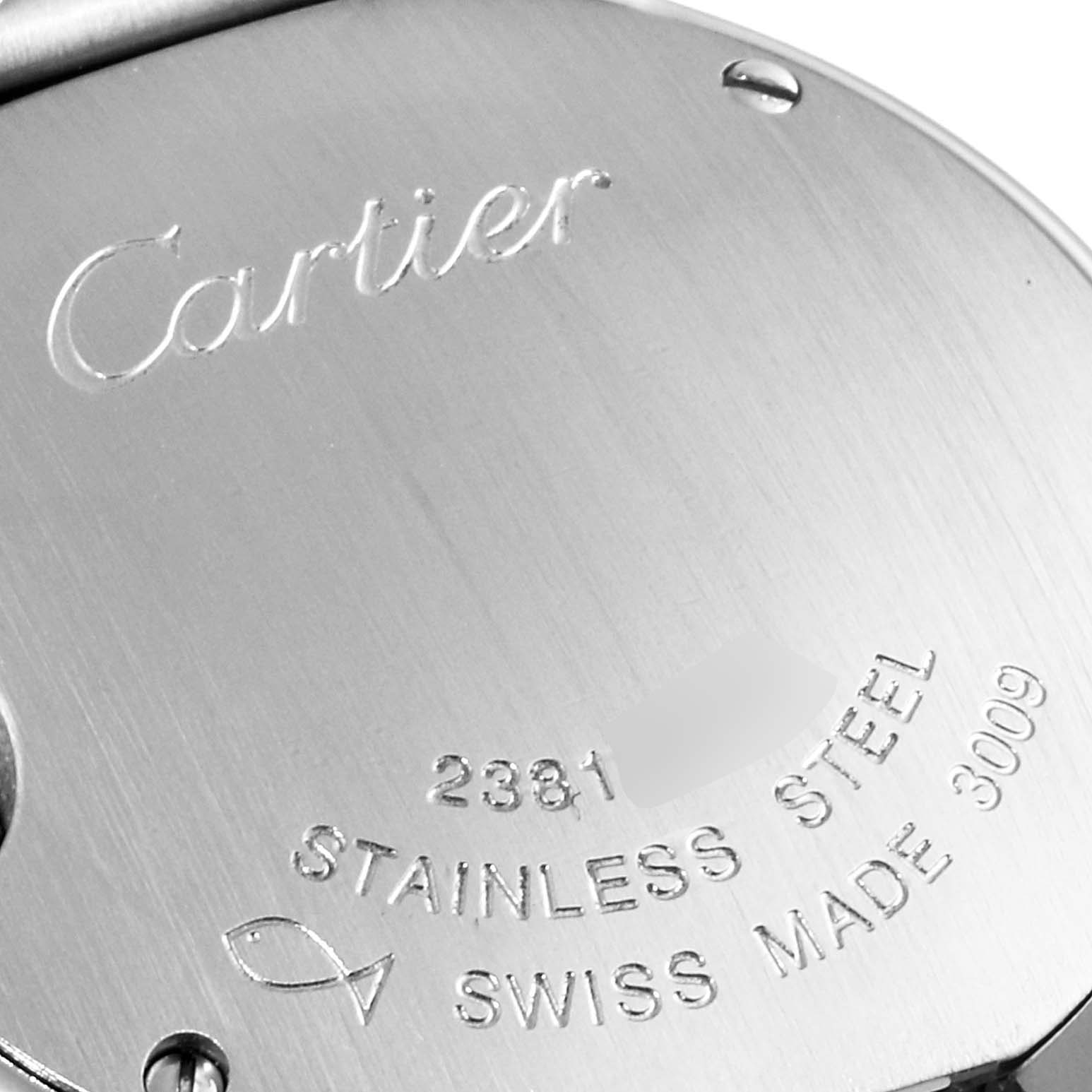 The image shows the back case of a Ballon Bleu de Cartier watch with engraved details about the model and material.