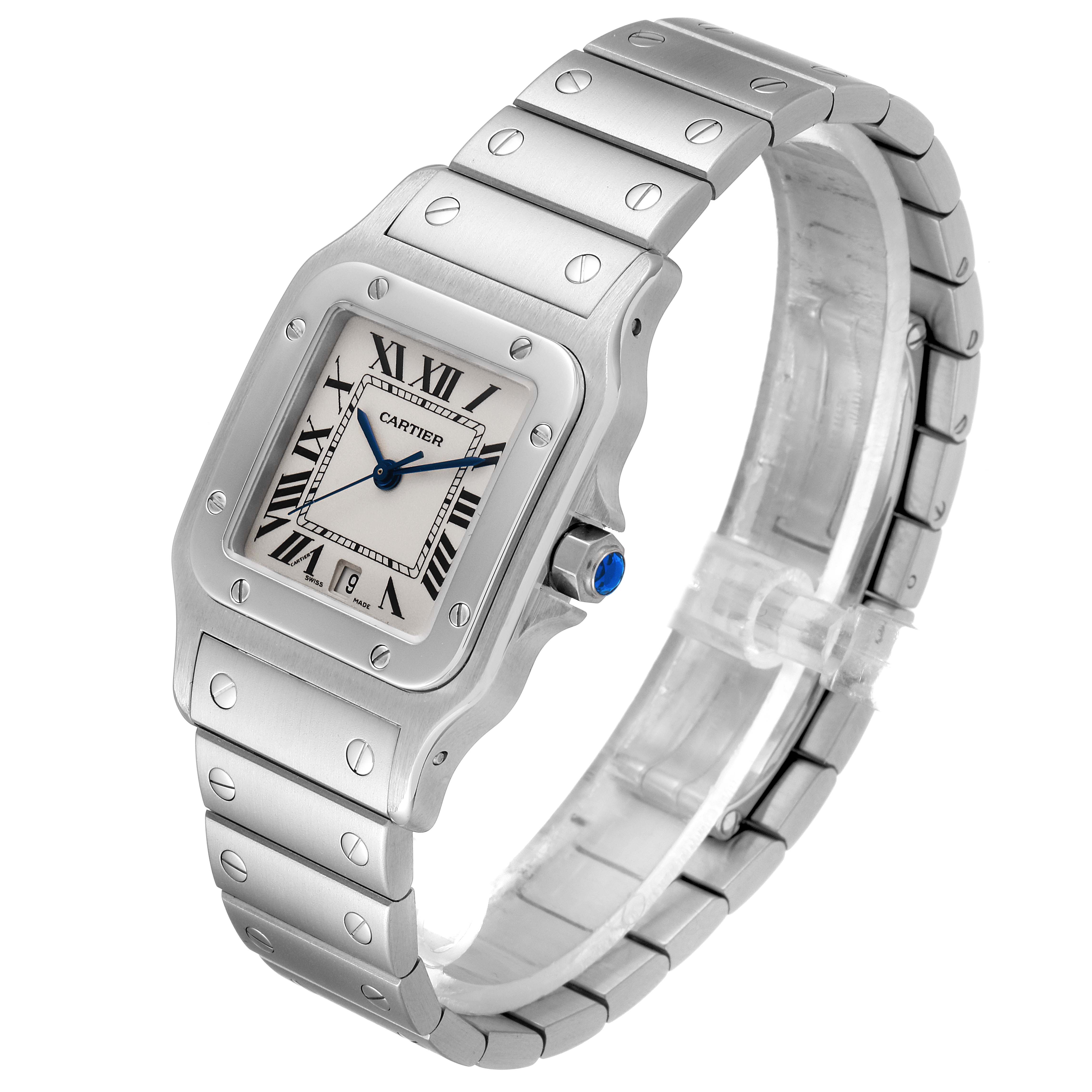 The image shows a Cartier Santos W20060D6 Men
s Stainless Steel Silver Dial W20060D6 Men
s Stainless Steel Silver Dial watch at a three-quarter angle, displaying its face, bracelet, and crown with the blue cabochon.