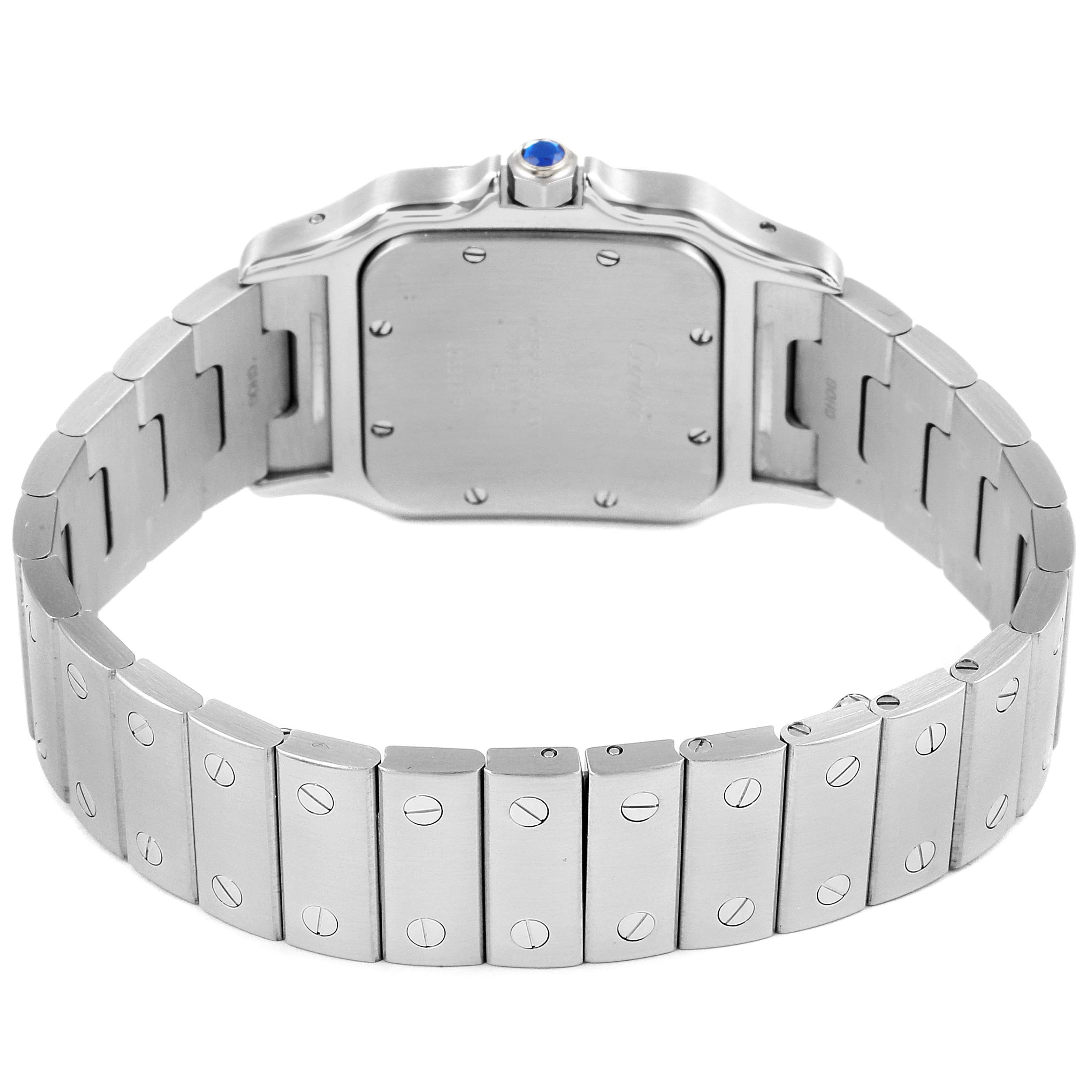 The image shows the back and bracelet of the Cartier Santos W20060D6 Men
s Stainless Steel Silver Dial W20060D6 Men
s Stainless Steel Silver Dial watch, highlighting the screw details and sapphire crown.