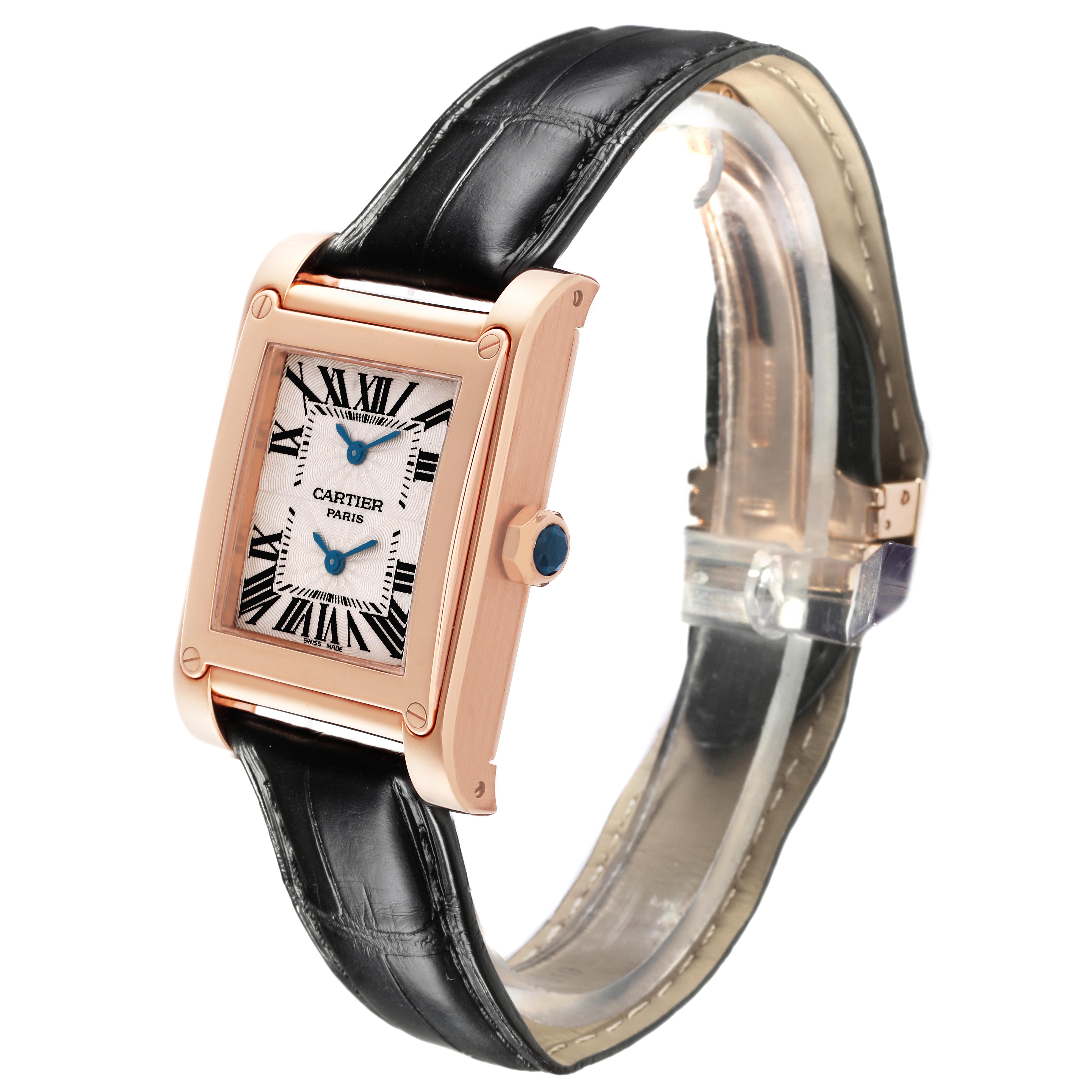 The Cartier Tank A Vis W1537651 Men's Rose Gold Silver Dial W1537651 Men's Rose Gold Silver Dial watch is shown at a three-quarter angle, highlighting its gold case, black leather strap, and face details.