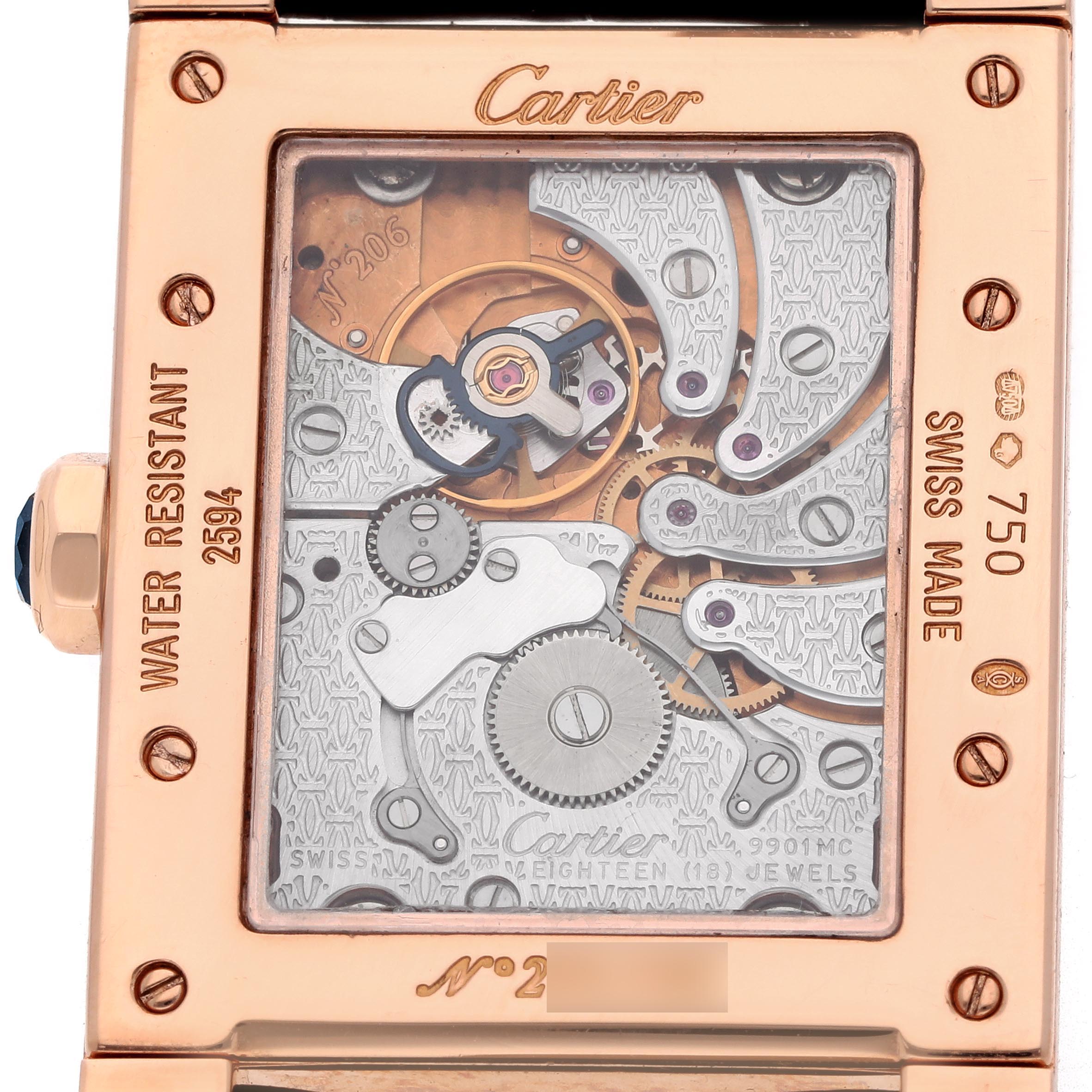 The image shows the back of the Cartier Tank A Vis W1537651 Men's Rose Gold Silver Dial W1537651 Men's Rose Gold Silver Dial, revealing the intricate watch movement and engravings.