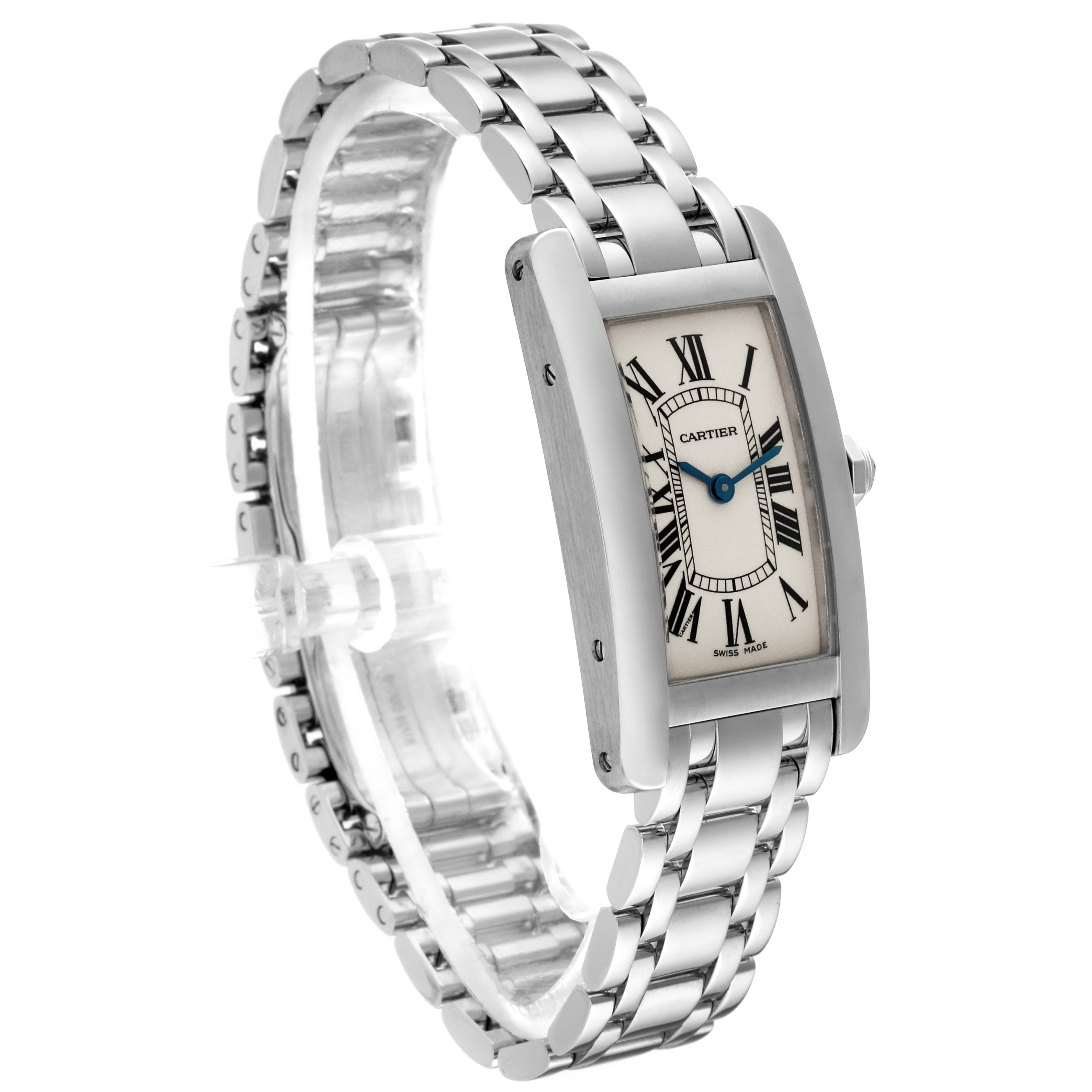 The image shows a side and front angle of a Cartier Tank Americaine W26019L1 Women's White Gold Silver Dial W26019L1 Women's White Gold Silver Dial watch, highlighting its bracelet, casing, and face with Roman numerals.