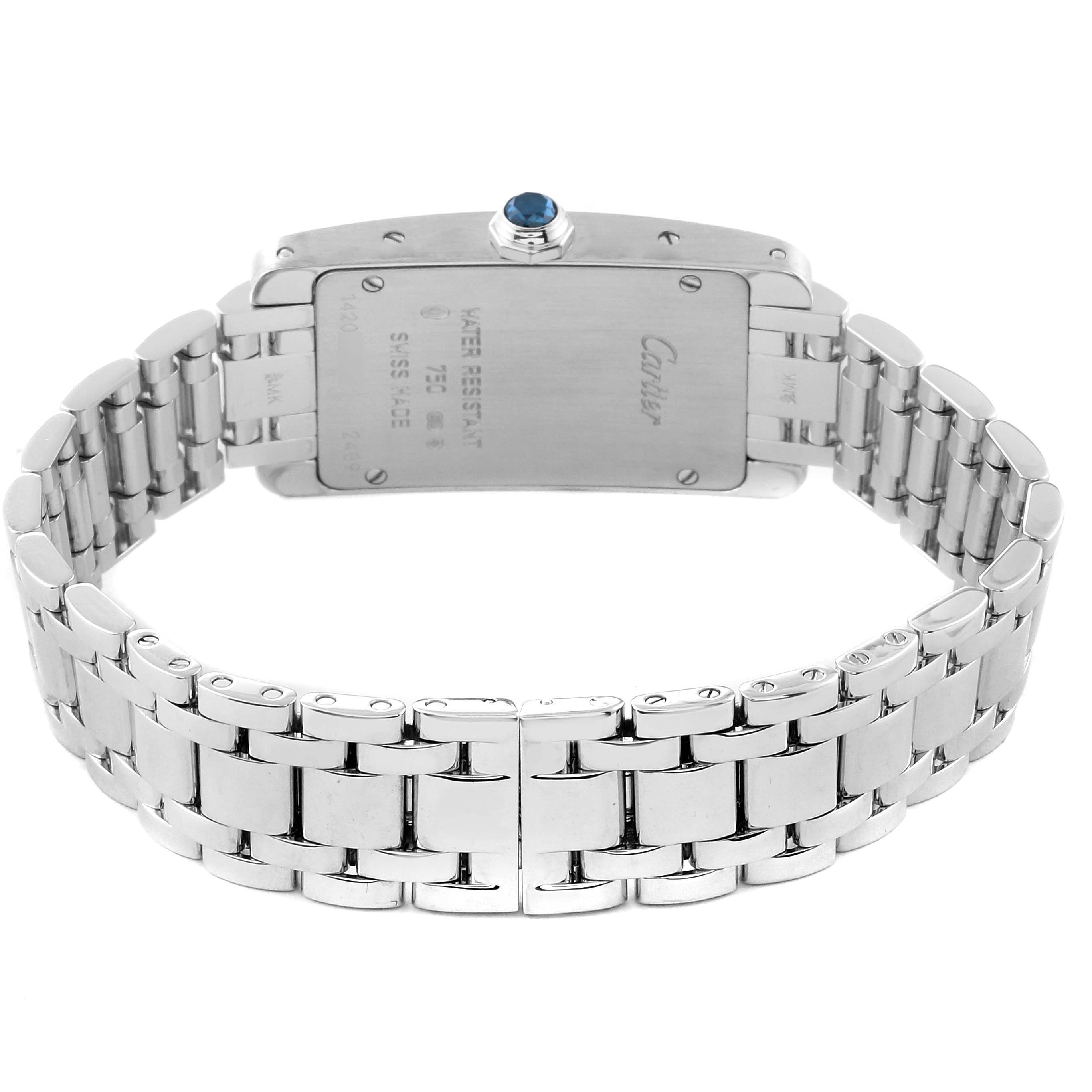 This image shows the back and bracelet of the Cartier Tank Americaine W26019L1 Women's White Gold Silver Dial W26019L1 Women's White Gold Silver Dial watch, featuring the stainless steel case and metal bracelet.