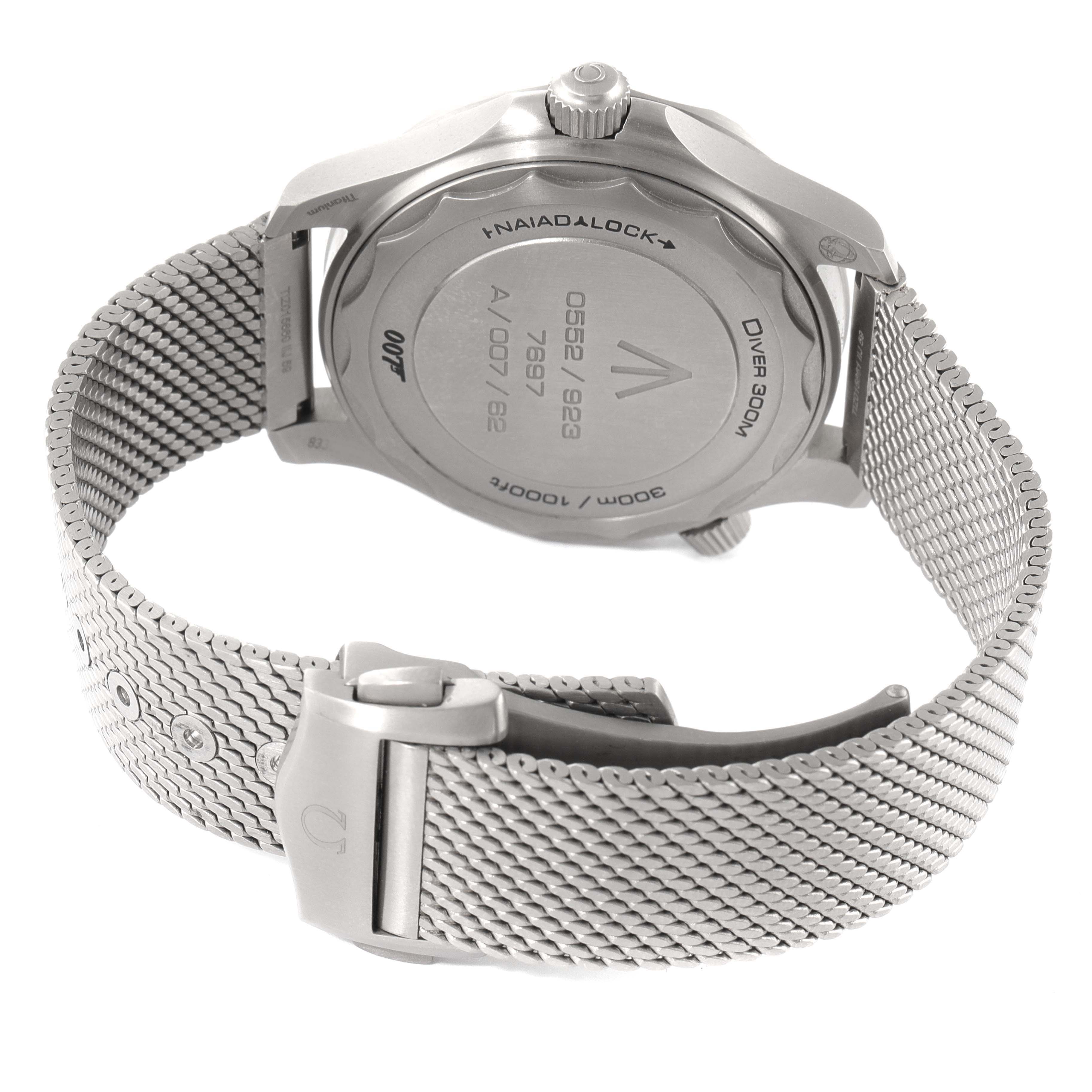 The image shows the back view of an Omega Seamaster 210.90.42.20.01.001 Men's Titanium Brown Dial 210.90.42.20.01.001 Men's Titanium Brown Dial watch, highlighting the case back and the metal mesh bracelet with clasp.