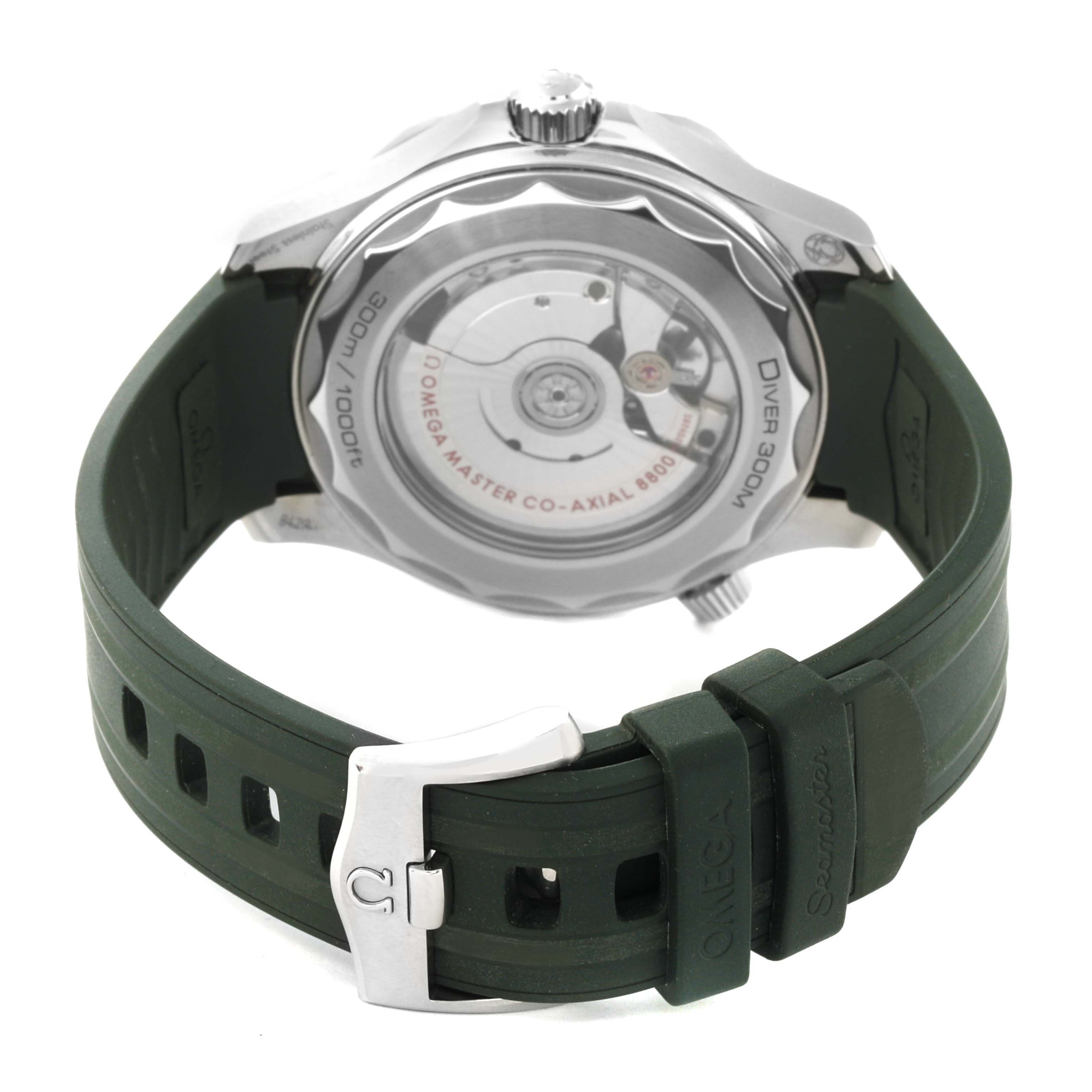 The image shows the back view of an Omega Seamaster 210.32.42.20.10.001 Men's Stainless Steel Green Dial 210.32.42.20.10.001 Men's Stainless Steel Green Dial watch with a green rubber strap and visible movement within the caseback.
