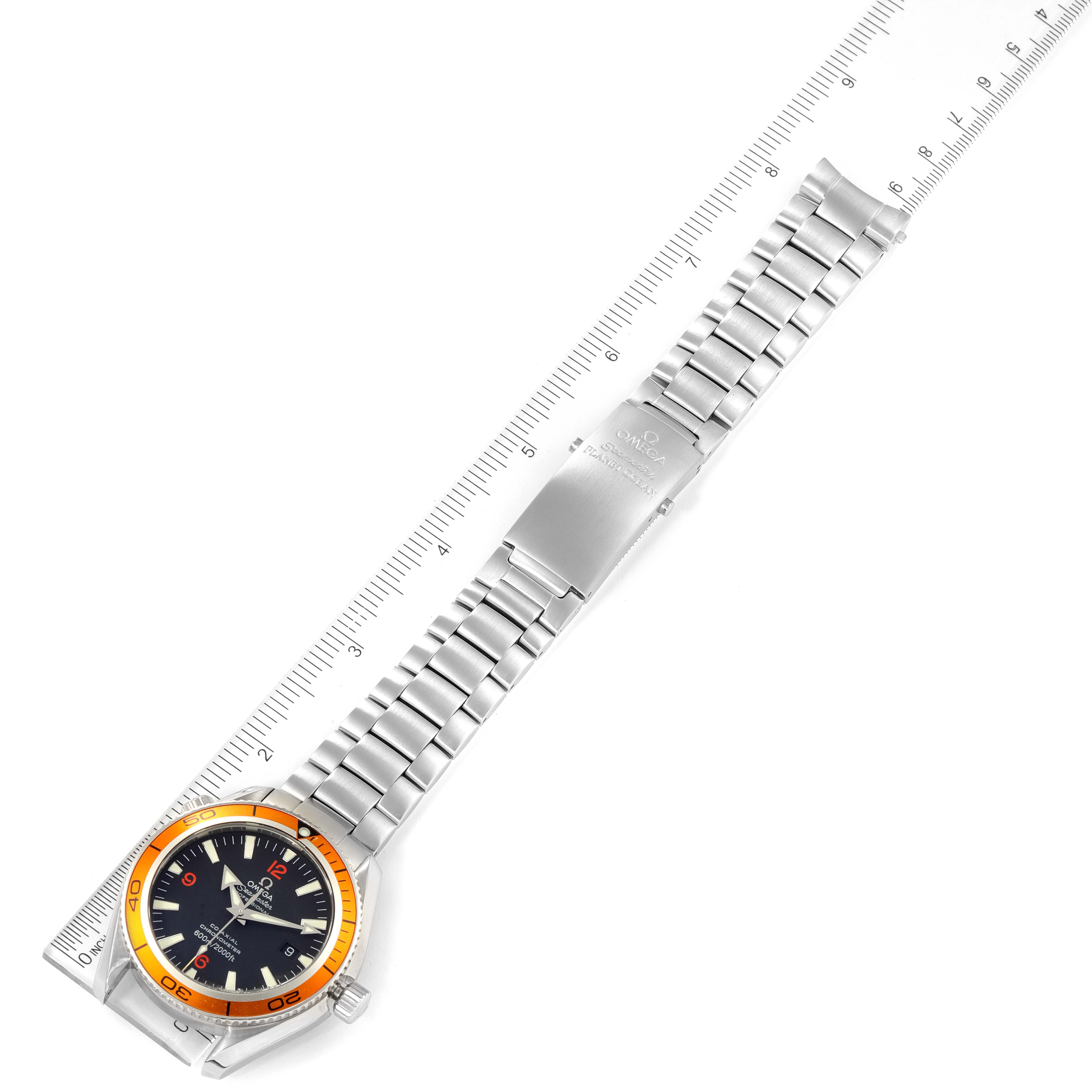 The image shows an angled top view of an Omega Planet Ocean 2209.50.00 Men
s Stainless Steel Black Dial 2209.50.00 Men
s Stainless Steel Black Dial watch displaying its face, bezel, and metal bracelet.