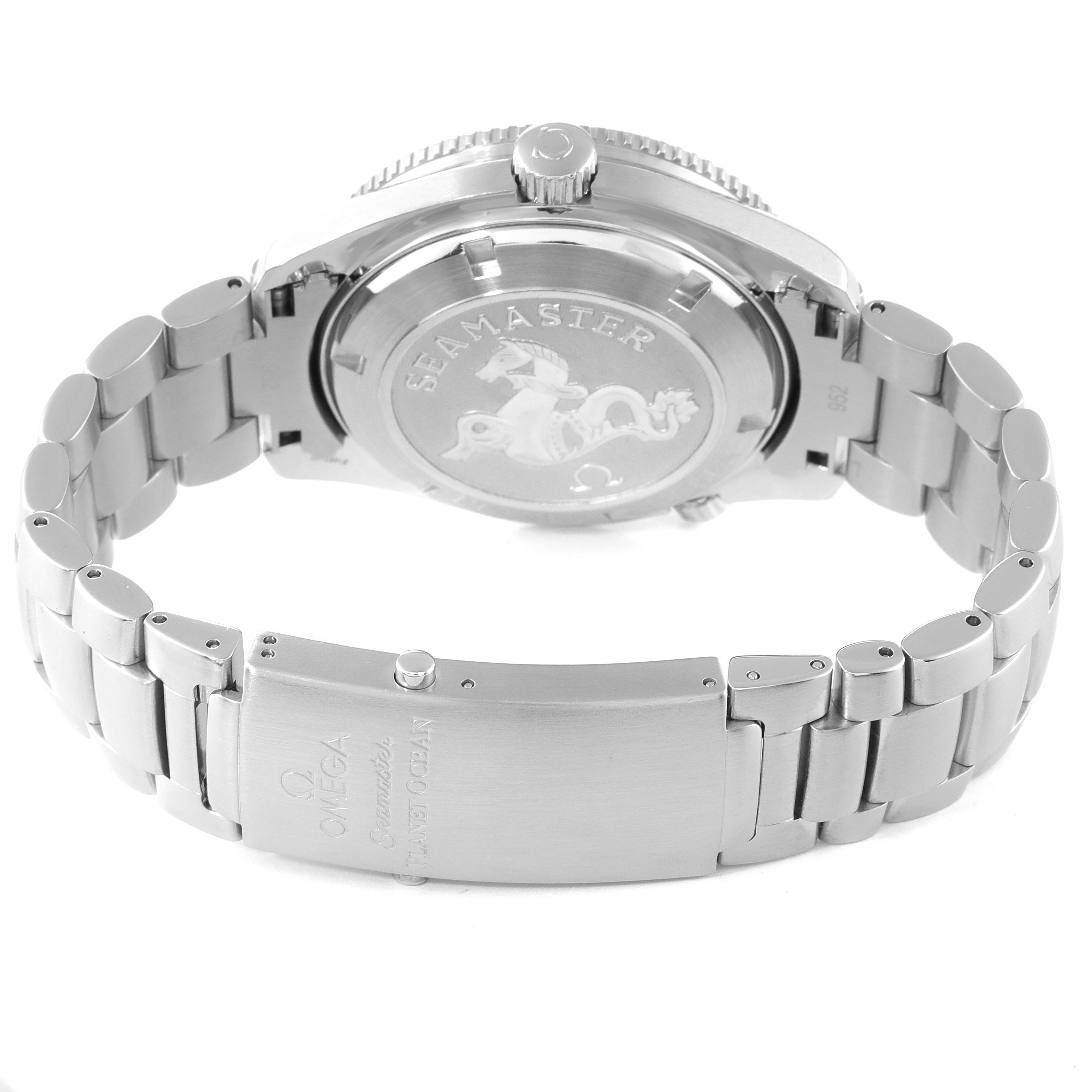 The image shows the back and clasp of the Omega Seamaster Planet Ocean watch at a slight angle.