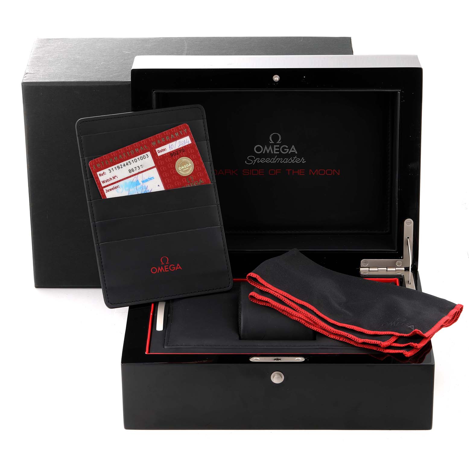 The image shows accessories for the Omega Speedmaster 311.92.44.51.01.003 Men's Ceramic Black Dial 311.92.44.51.01.003 Men's Ceramic Black Dial watch, including a case, cardholder, and cleaning cloth, from a front angle.