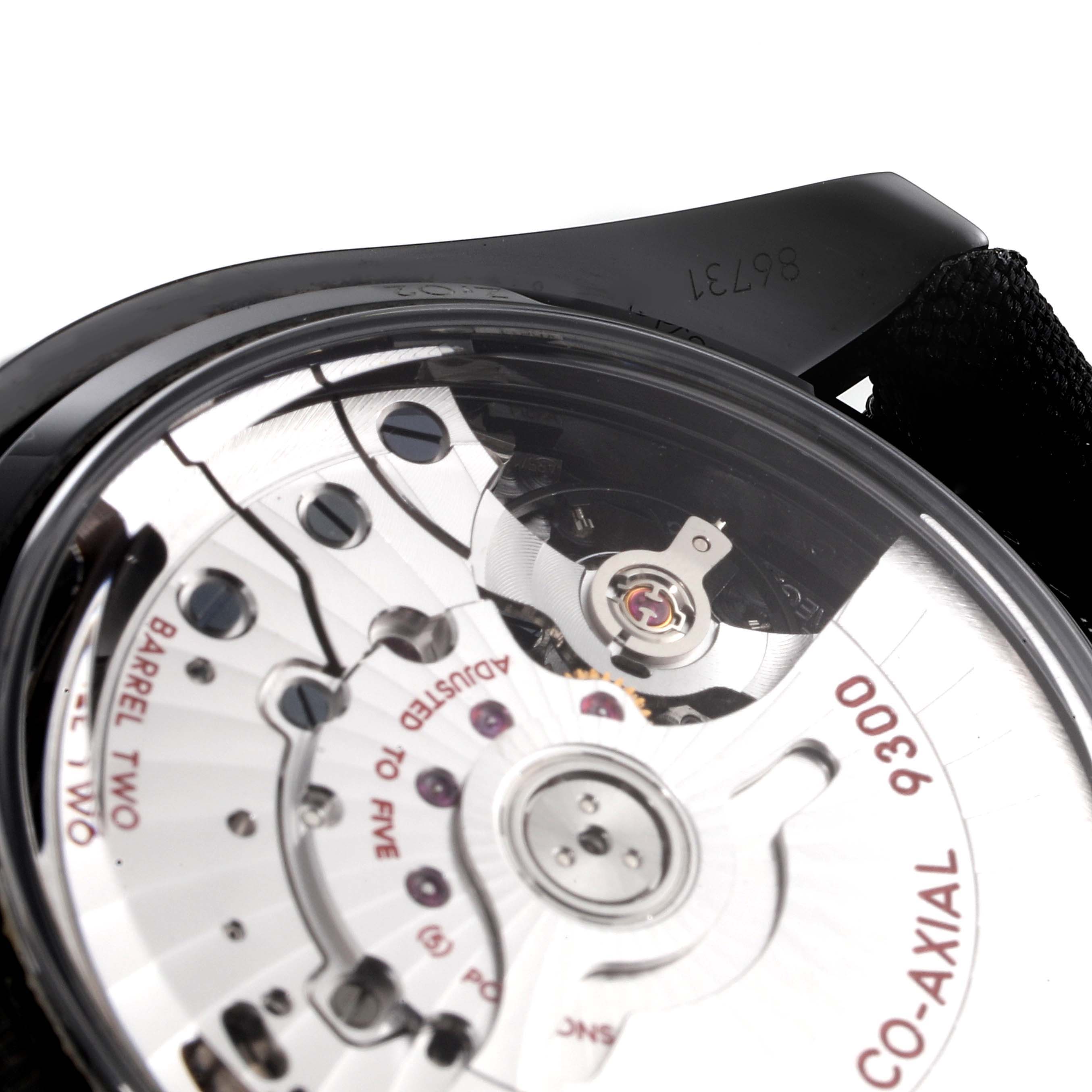 The image shows the back of an Omega Speedmaster 311.92.44.51.01.003 Men's Ceramic Black Dial 311.92.44.51.01.003 Men's Ceramic Black Dial watch, highlighting the co-axial 9300 movement.