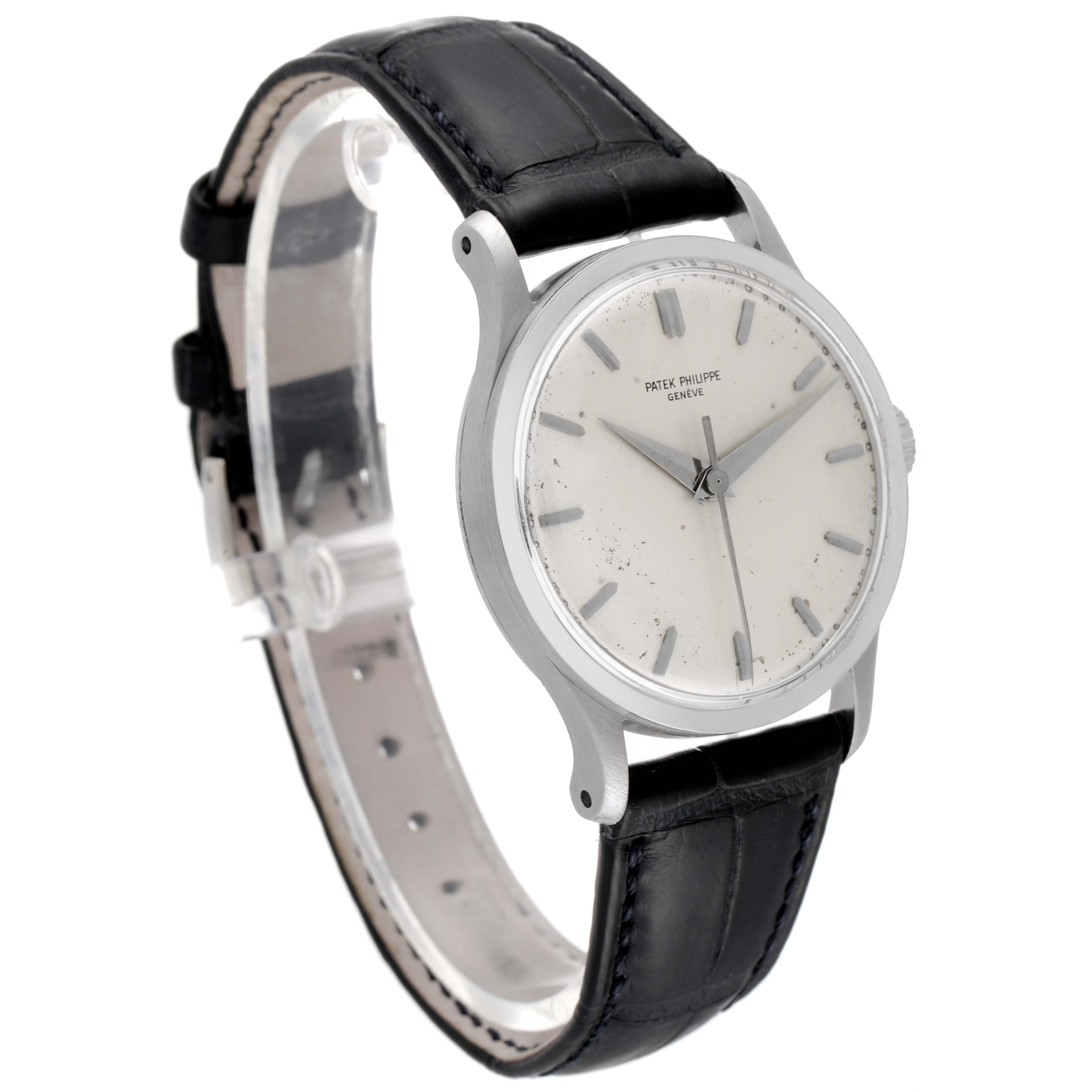 The image shows a Patek Philippe Calatrava 570 Men's White Gold Silver Dial 570 Men's White Gold Silver Dial watch at a slight angle, highlighting the face, case, and black leather strap.