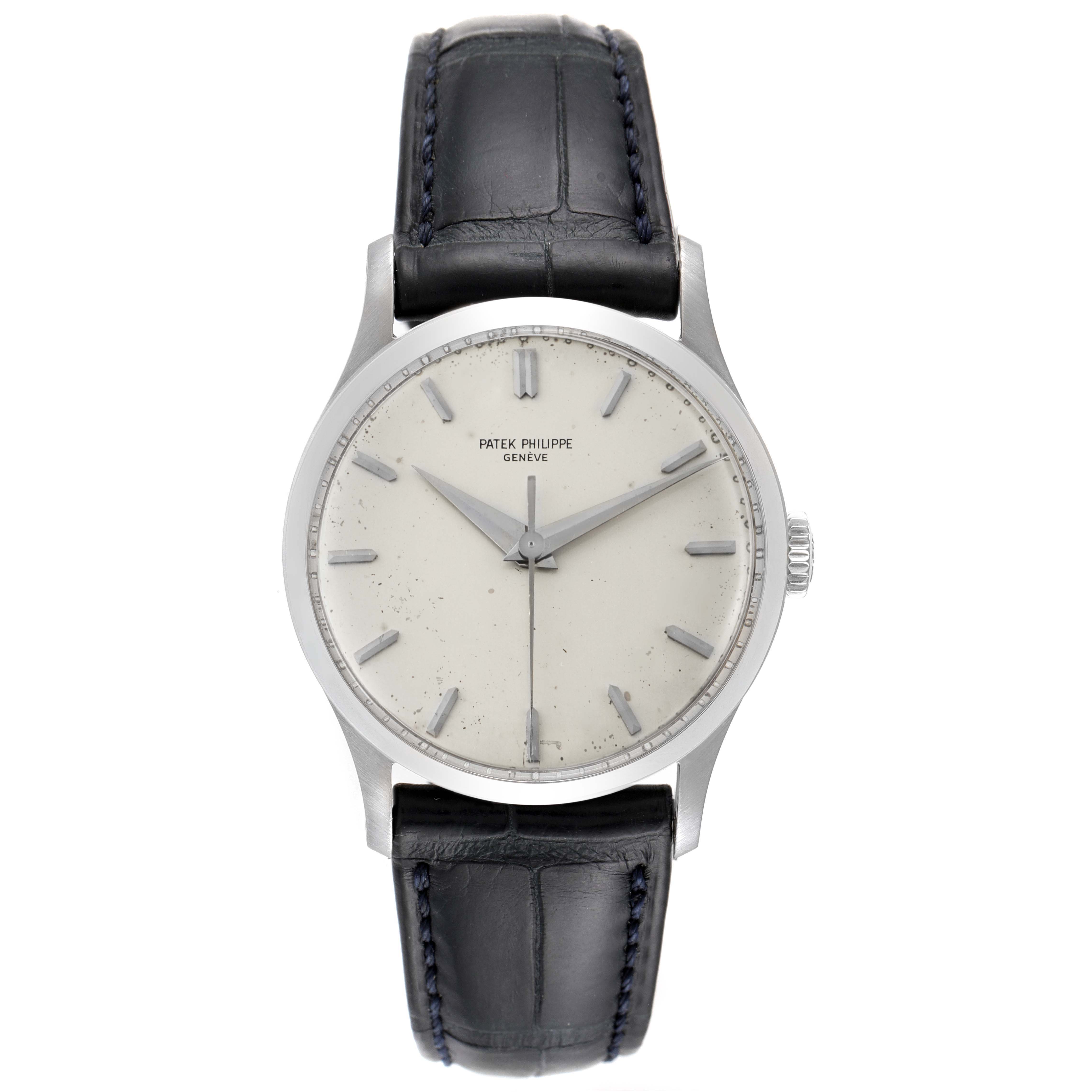 This image shows a front view of a Patek Philippe Calatrava 570 Men's White Gold Silver Dial 570 Men's White Gold Silver Dial watch featuring a leather strap and a minimalist dial.