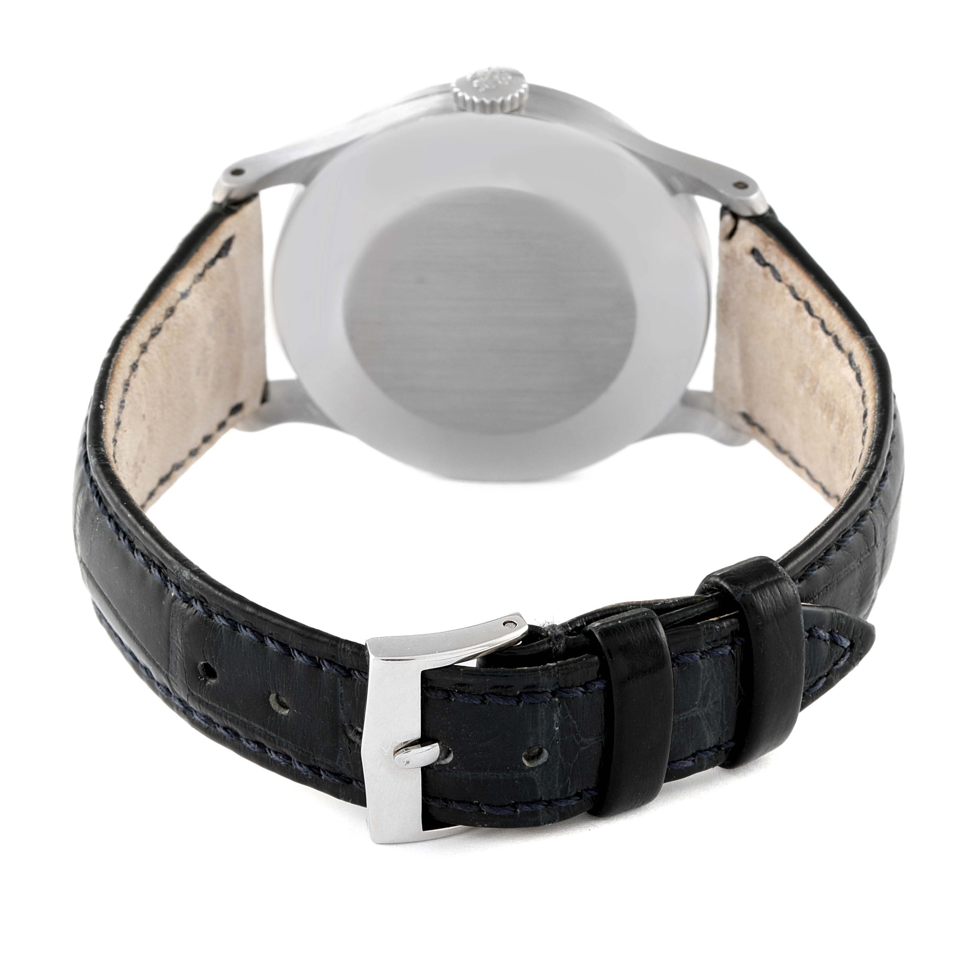 The image shows the back view of a Patek Philippe Calatrava 570 Men's White Gold Silver Dial, highlighting the case back and leather strap with buckle.