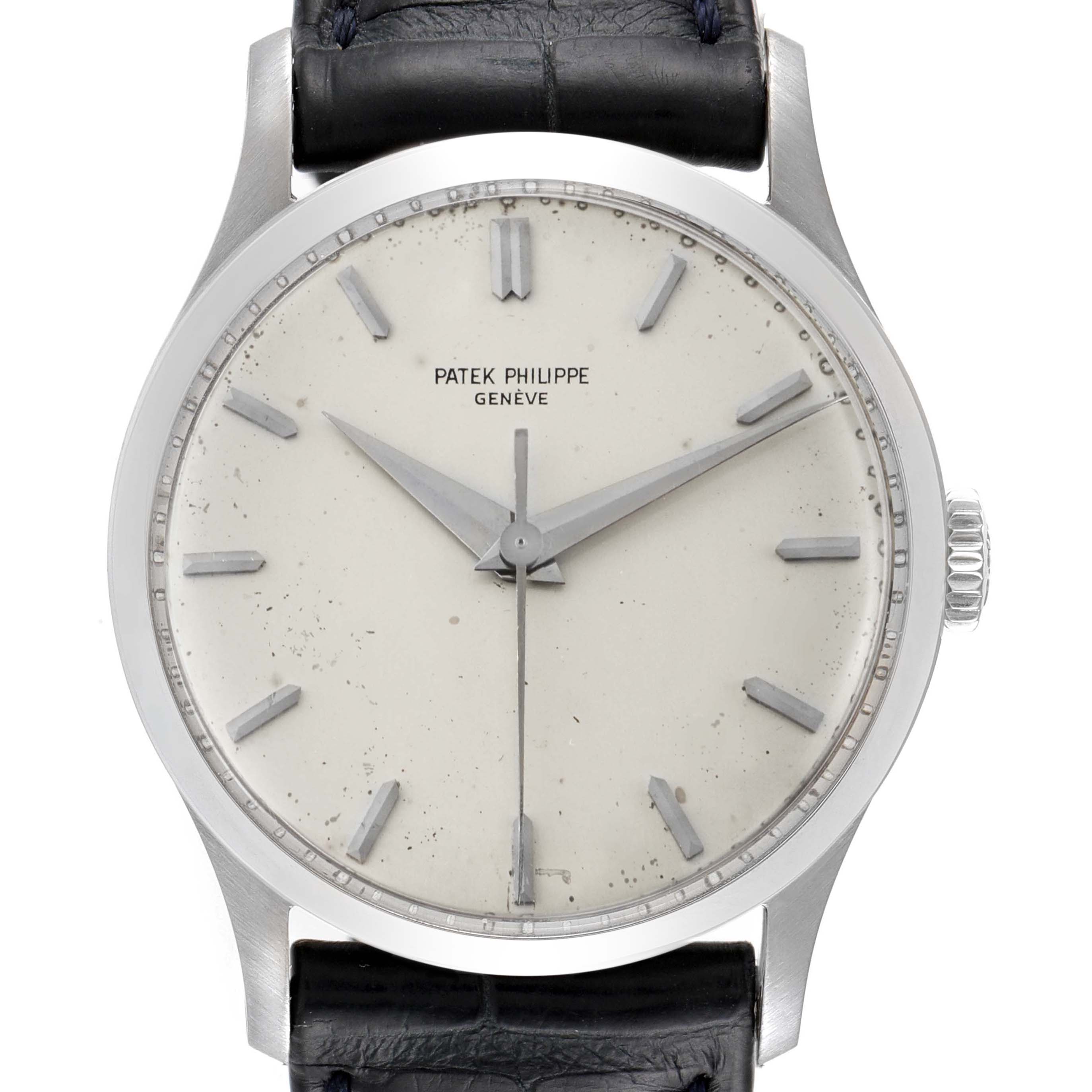 The image shows a front view of a Patek Philippe Calatrava 570 Men's White Gold Silver Dial 570 Men's White Gold Silver Dial watch, focusing on the dial, case, crown, and part of the strap.