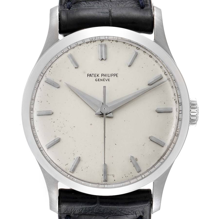 The image shows a front view of a Patek Philippe Calatrava watch, focusing on the dial, case, crown, and part of the strap.