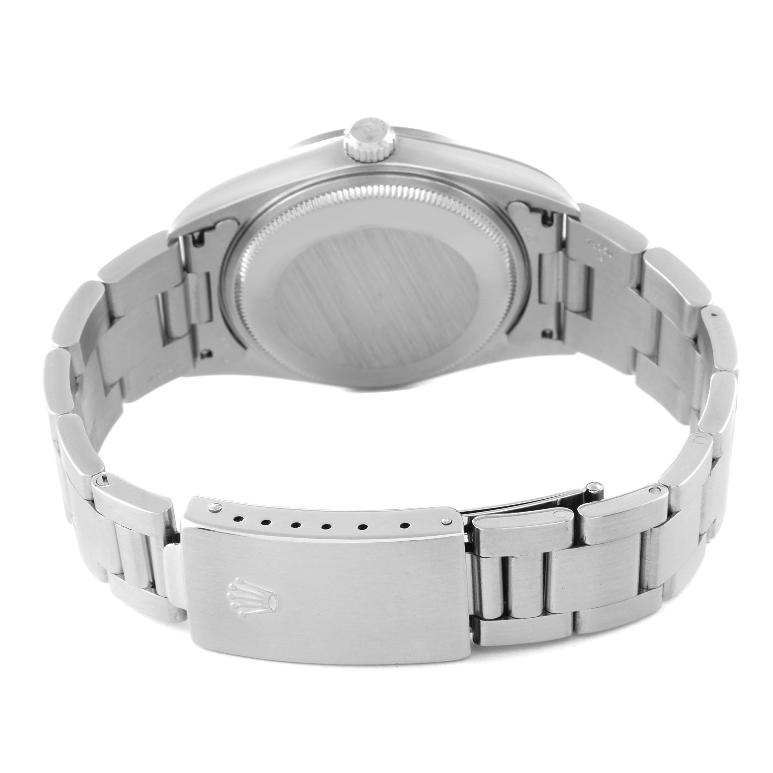 The image shows the back case and bracelet of a Rolex Air-King 14000 Men's Stainless Steel Black Dial 14000 Men's Stainless Steel Black Dial watch, with the clasp featuring the Rolex logo.