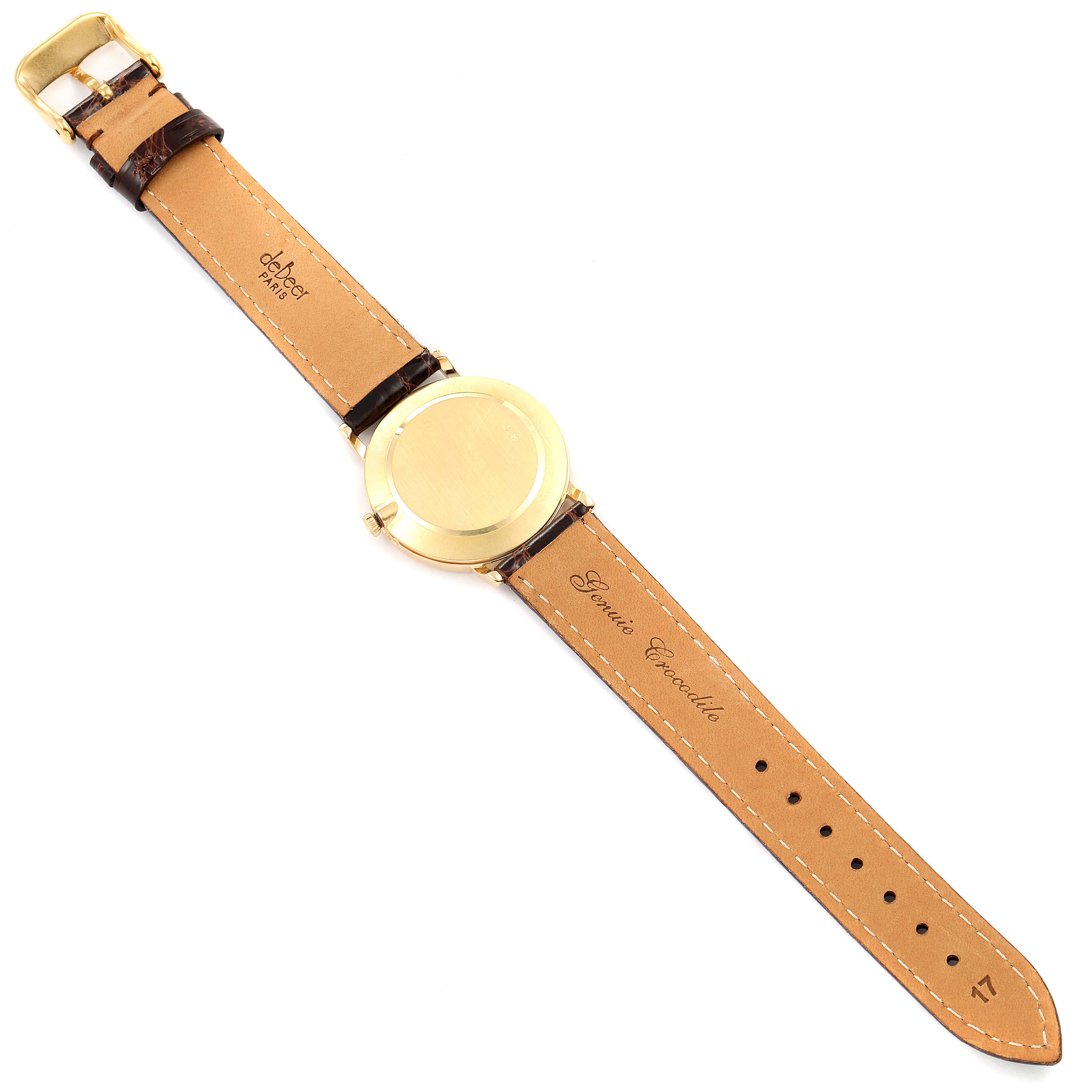 This image shows the back of a Rolex Cellini 5112 Men's Yellow Gold Beige Dial 5112 Men's Yellow Gold Beige Dial watch, including the strap, buckle, and case back.