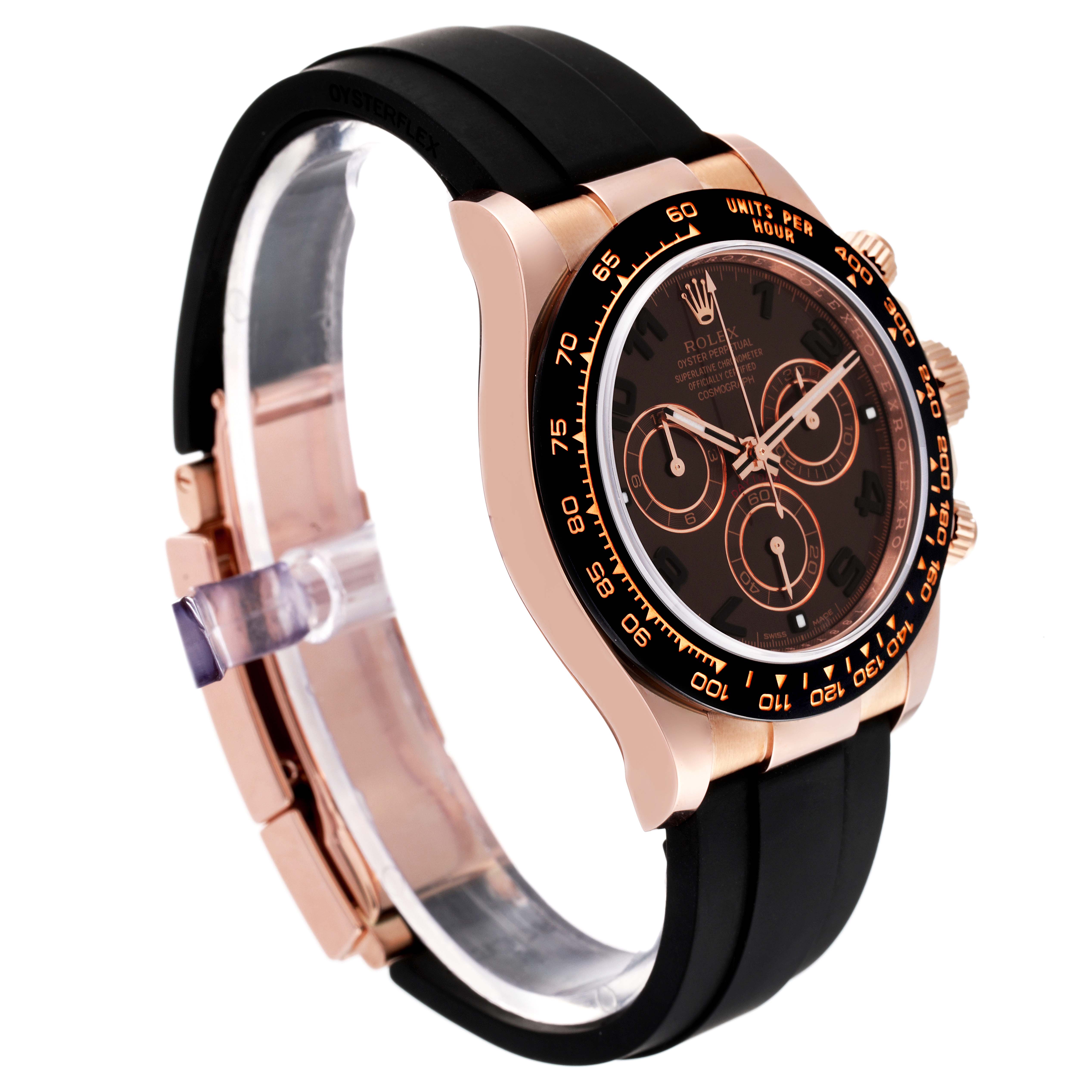 This image shows a side angle of a Rolex Daytona 116515 Men's Rose Gold Brown Dial 116515 Men's Rose Gold Brown Dial watch, highlighting its rose gold case, black bezel, and black rubber strap.