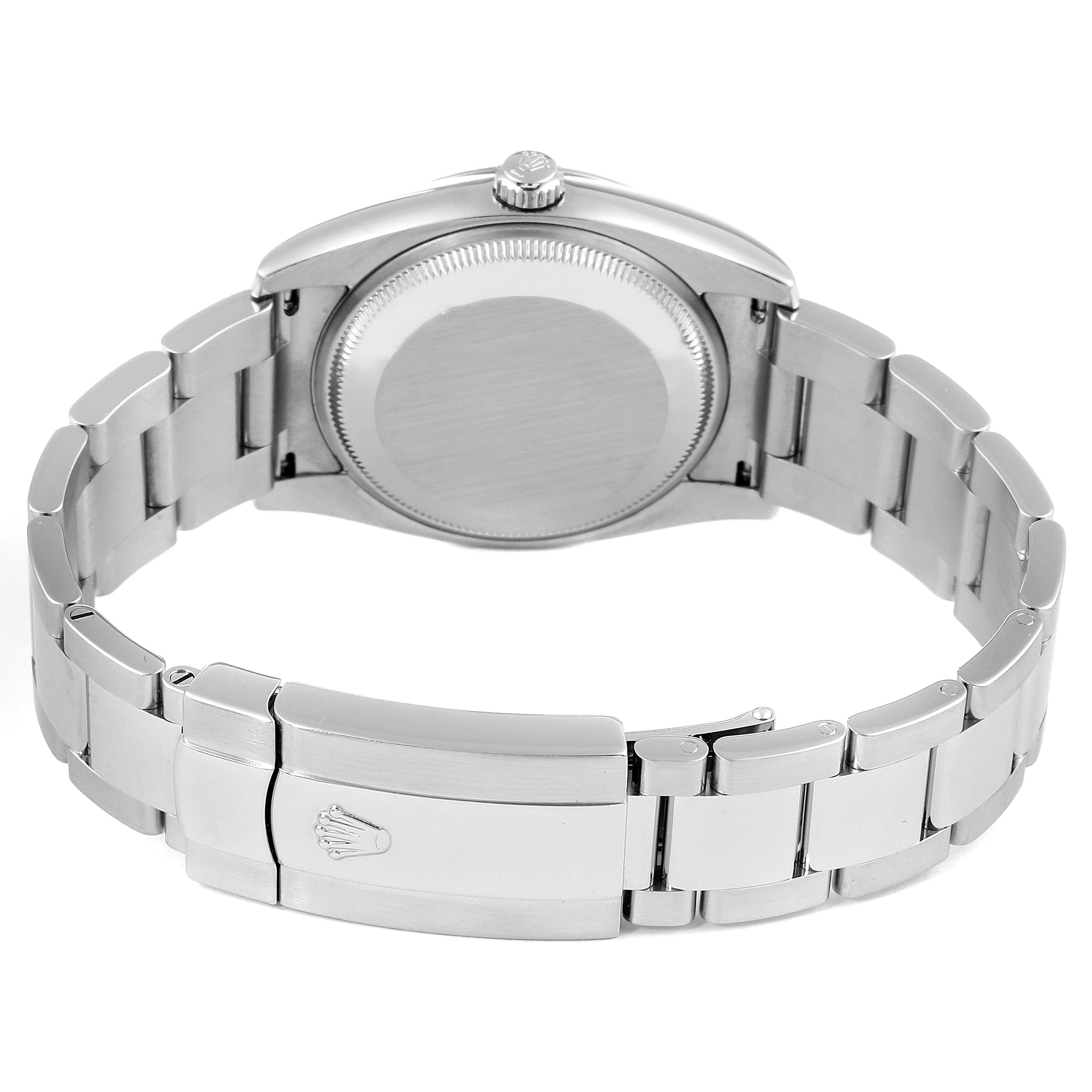 This image shows the back and bracelet of a Rolex Date 115234 Men's Stainless Steel Black Dial 115234 Men's Stainless Steel Black Dial model watch from a rear angle.