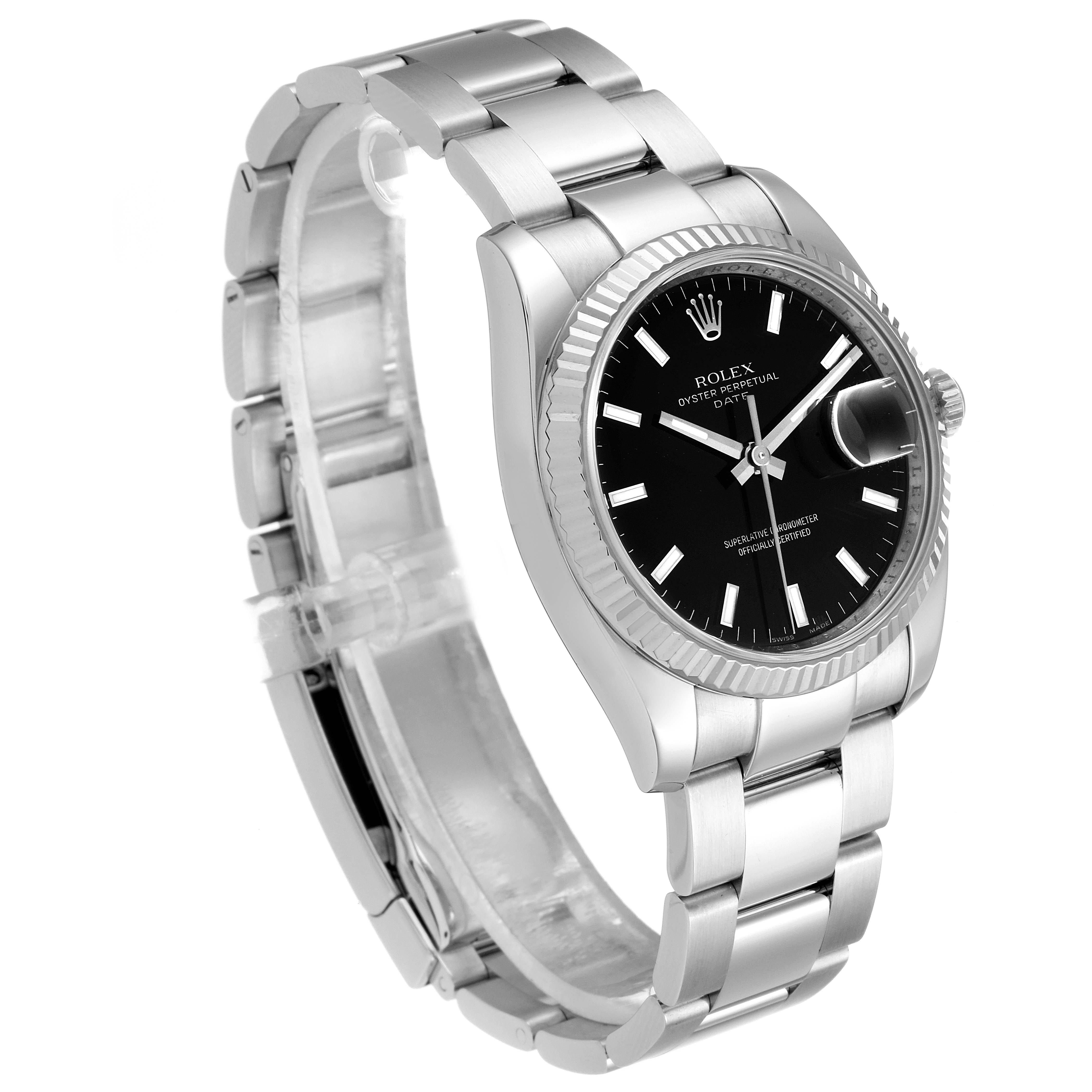 The image shows a three-quarter angle view of a Rolex Date 115234 Men's Stainless Steel Black Dial 115234 Men's Stainless Steel Black Dial model watch, highlighting the bracelet, black dial, and fluted bezel.