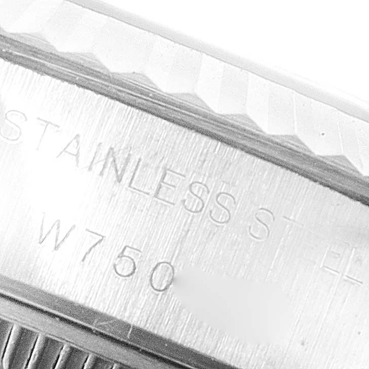 This image shows a close-up of the side profile of the Rolex Datejust 69174 Women
s Stainless Steel White Dial 69174 Women
s Stainless Steel White Dial watch case, highlighting its stainless steel material and model number.