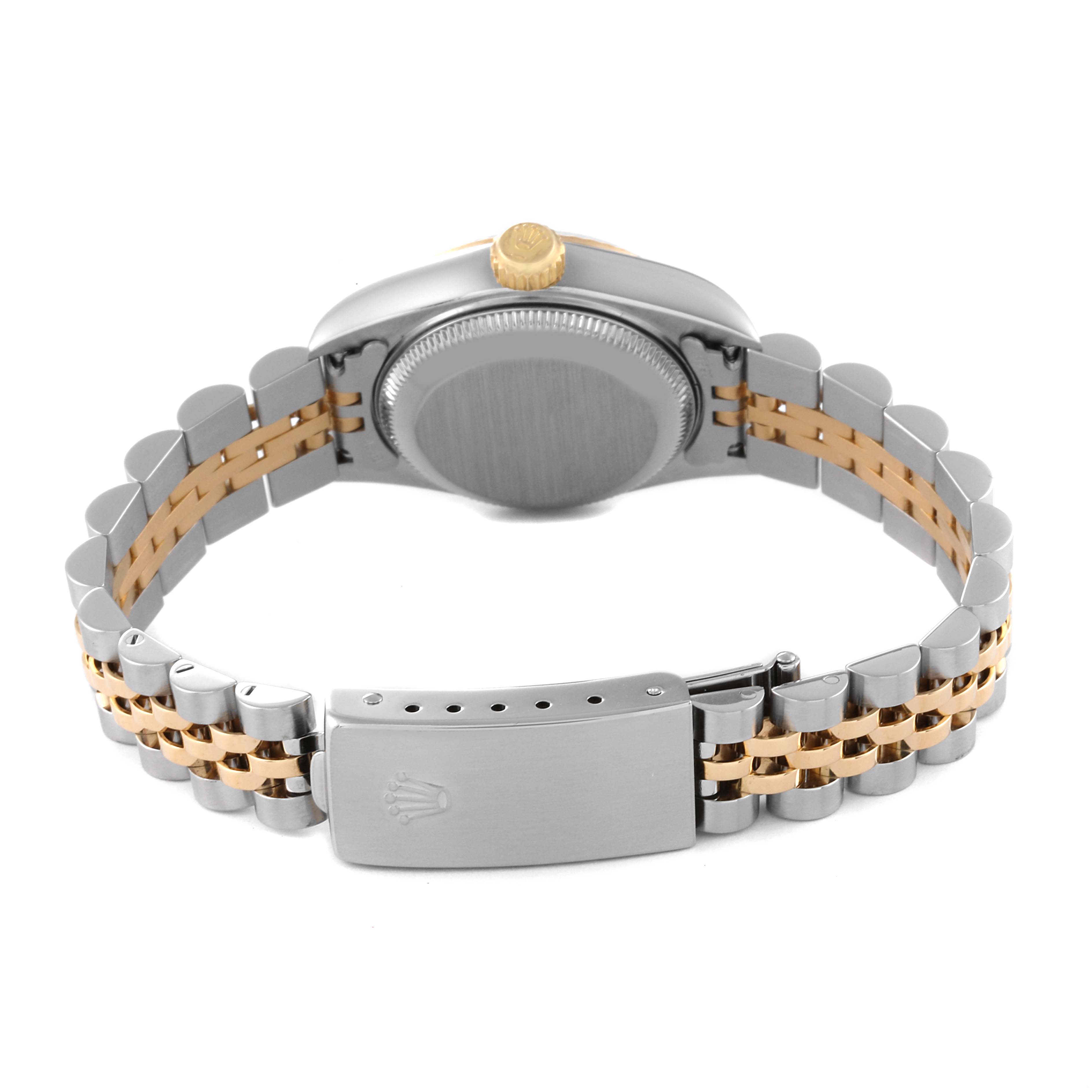 This image shows the back view of a Rolex Datejust 79173 Women's Steel and Gold (two tone) White Dial 79173 Women's Steel and Gold (two tone) White Dial watch, displaying its case back, crown, and two-tone bracelet with clasp.