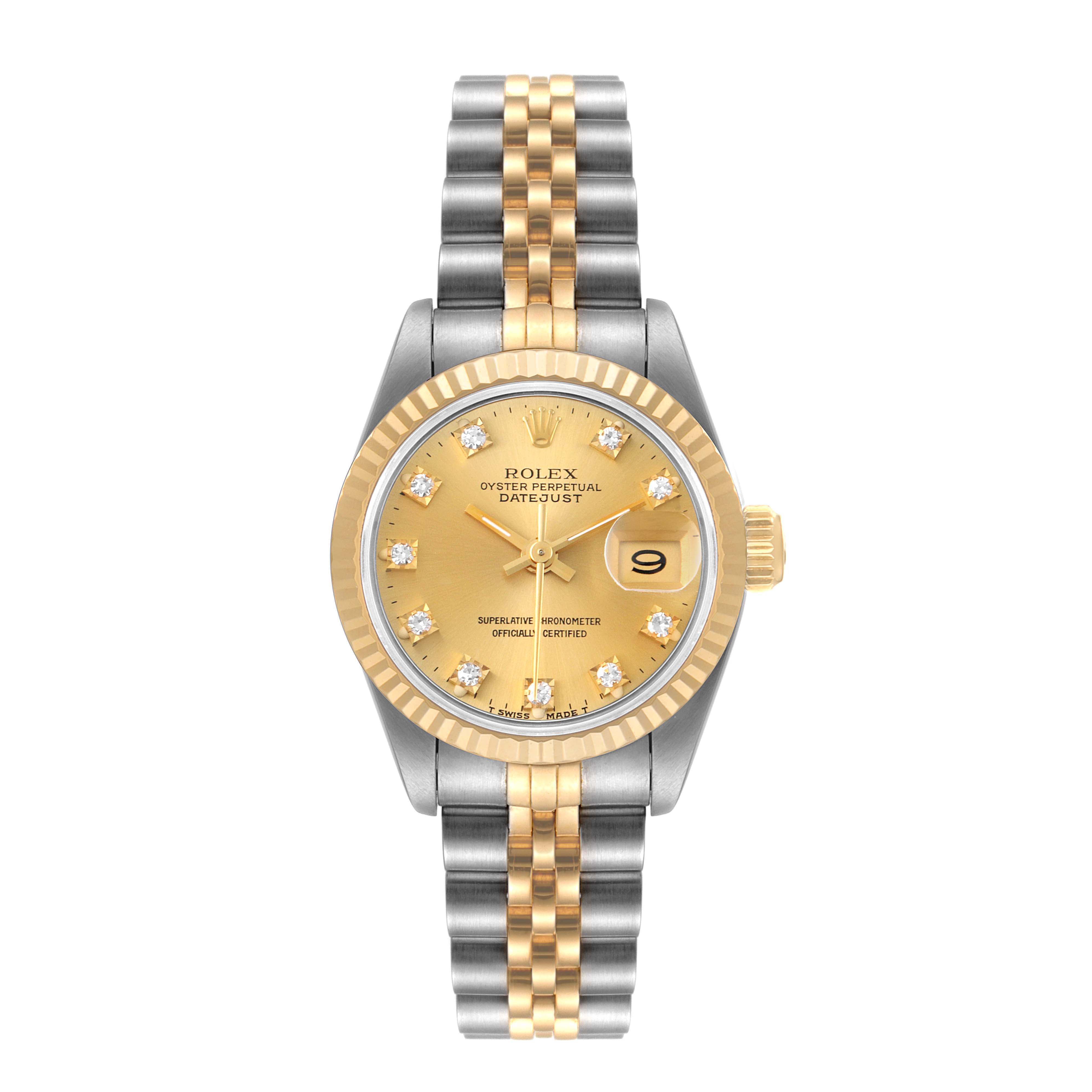 The Rolex Datejust 69173 Women
s Steel and Gold (two tone) Champagne Dial 69173 Women
s Steel and Gold (two tone) Champagne Dial watch is shown from the front, displaying its gold dial, date window, and dual-tone bracelet.