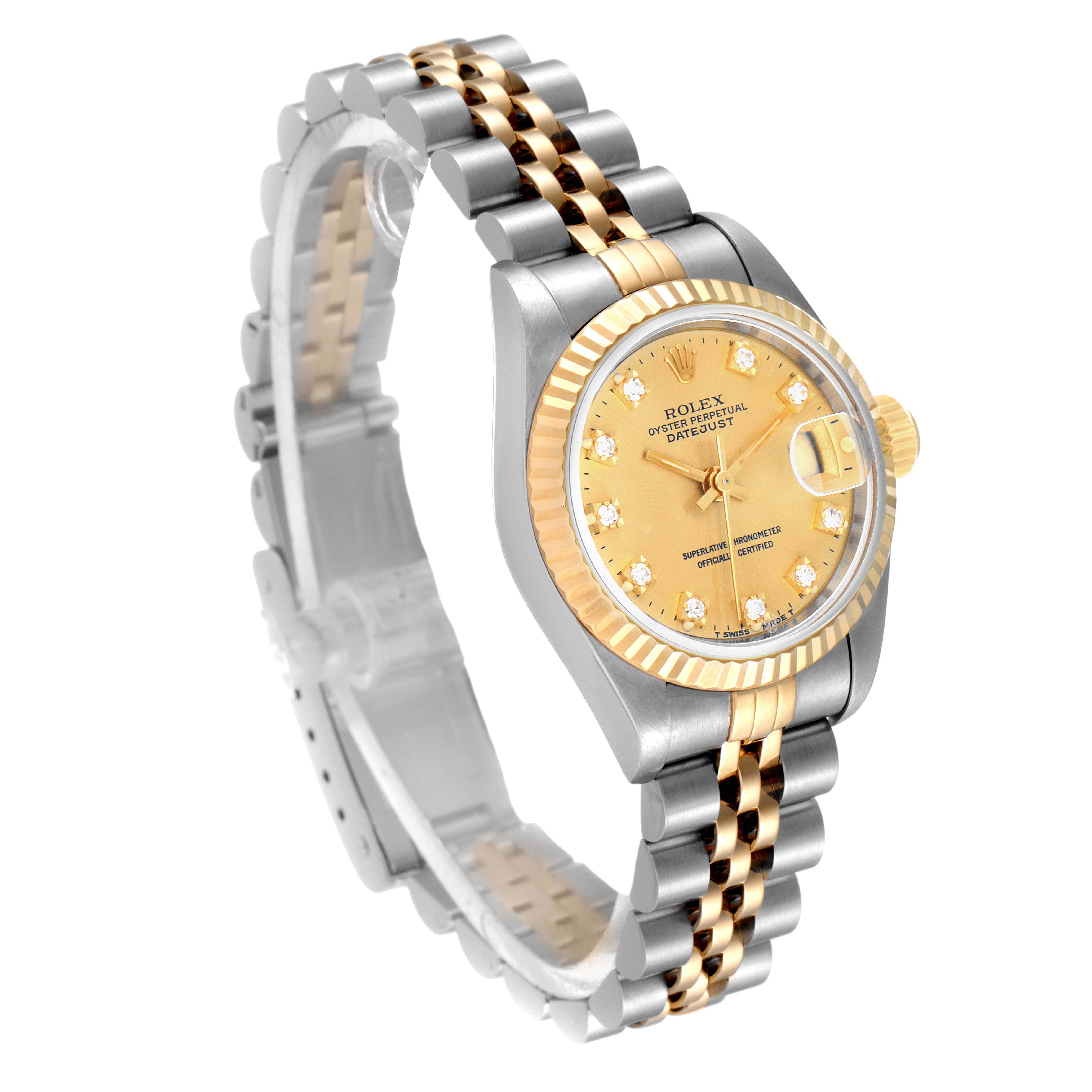 The Rolex Datejust 69173 Women
s Steel and Gold (two tone) Champagne Dial 69173 Women
s Steel and Gold (two tone) Champagne Dial watch is shown at a three-quarter angle, displaying its dial, fluted bezel, and jubilee bracelet.