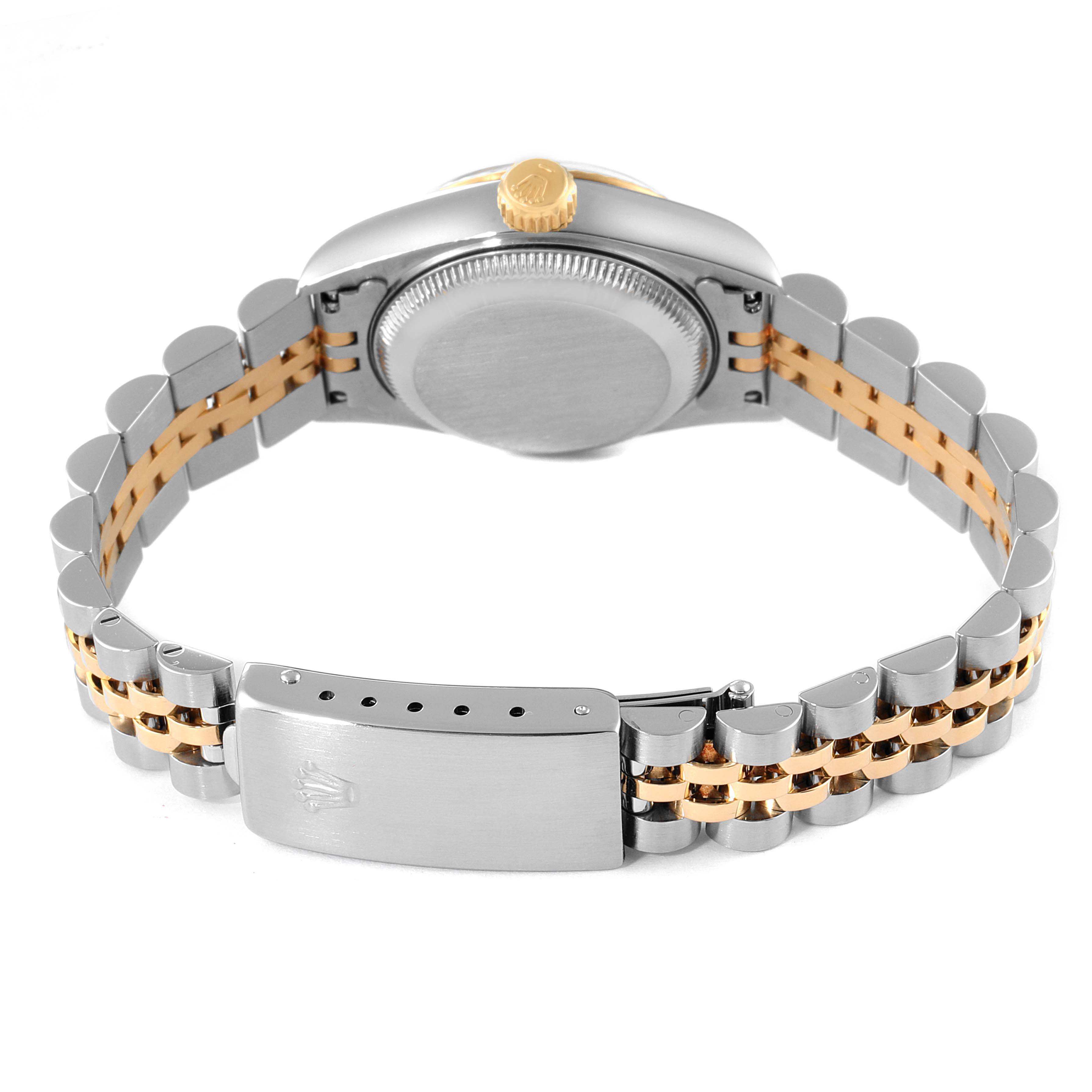This image shows the back view of a Rolex Datejust 69173 Women
s Steel and Gold (two tone) Champagne Dial 69173 Women
s Steel and Gold (two tone) Champagne Dial model watch, highlighting its two-tone bracelet, case back, and crown.
